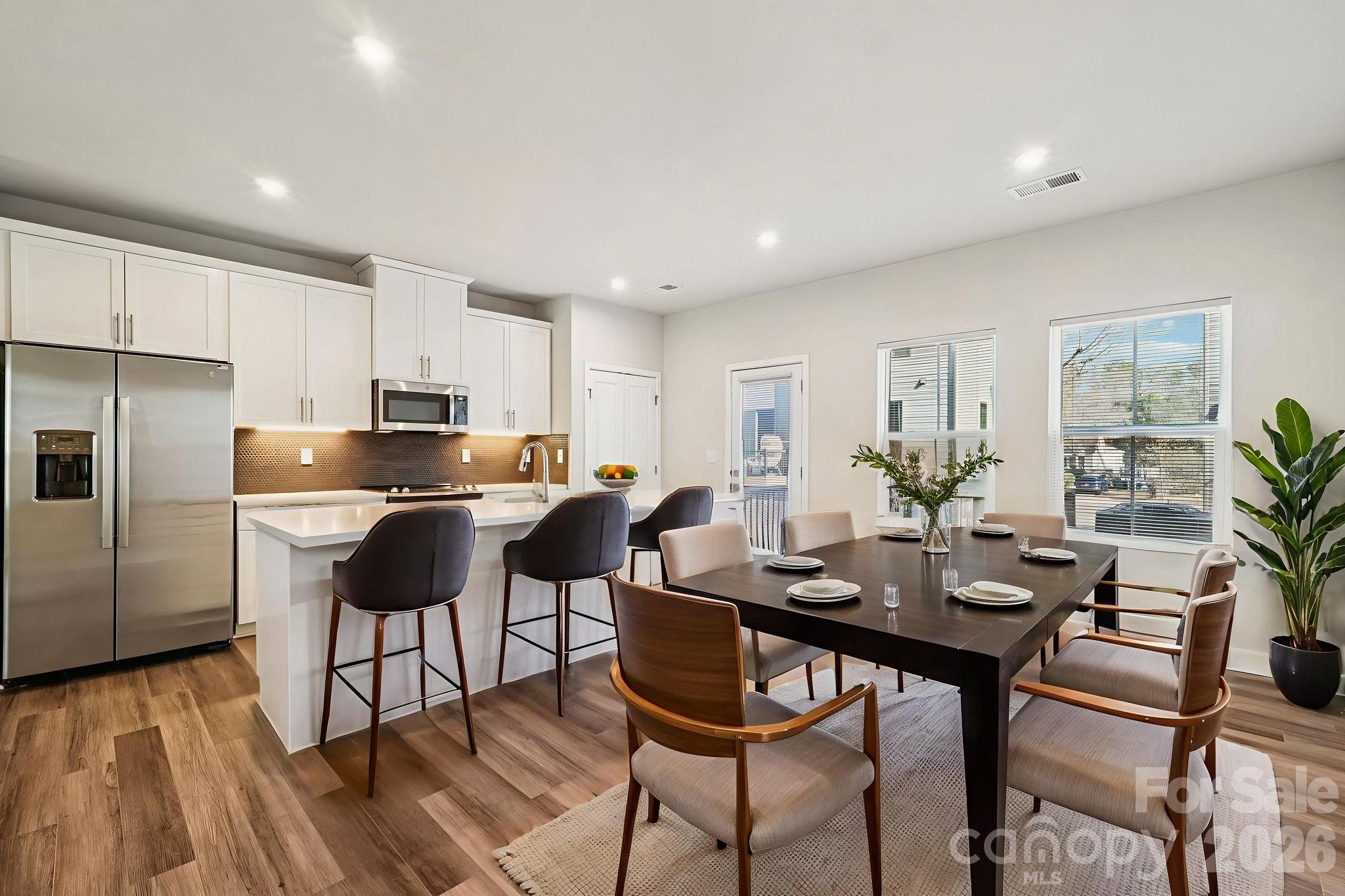 Welcome to the perfect home in Wendover Green! Ideally positioned directly across from a 1-acre wooded park, this townhome offers green space without sacrificing location. The rare combination of tree-lined views from your living room, yet just minutes from Uptown, Cotswold, Plaza Midwood, and so much more.

This thoughtfully designed open concept floor plan includes one of the few side-by-side 2-car garages in the community and is filled with upgrades throughout! Hardwood stairs, a spacious chef-style kitchen with a massive island, and stainless steel appliances—perfect for both everyday living and entertaining.

Wendover Green delivers true community living complete with a private dog park, nature views, and a welcoming neighborhood atmosphere—all in a location you’ll never want to leave. 

ASK ABOUT OUR 1% lender-paid credit with our preferred lender!