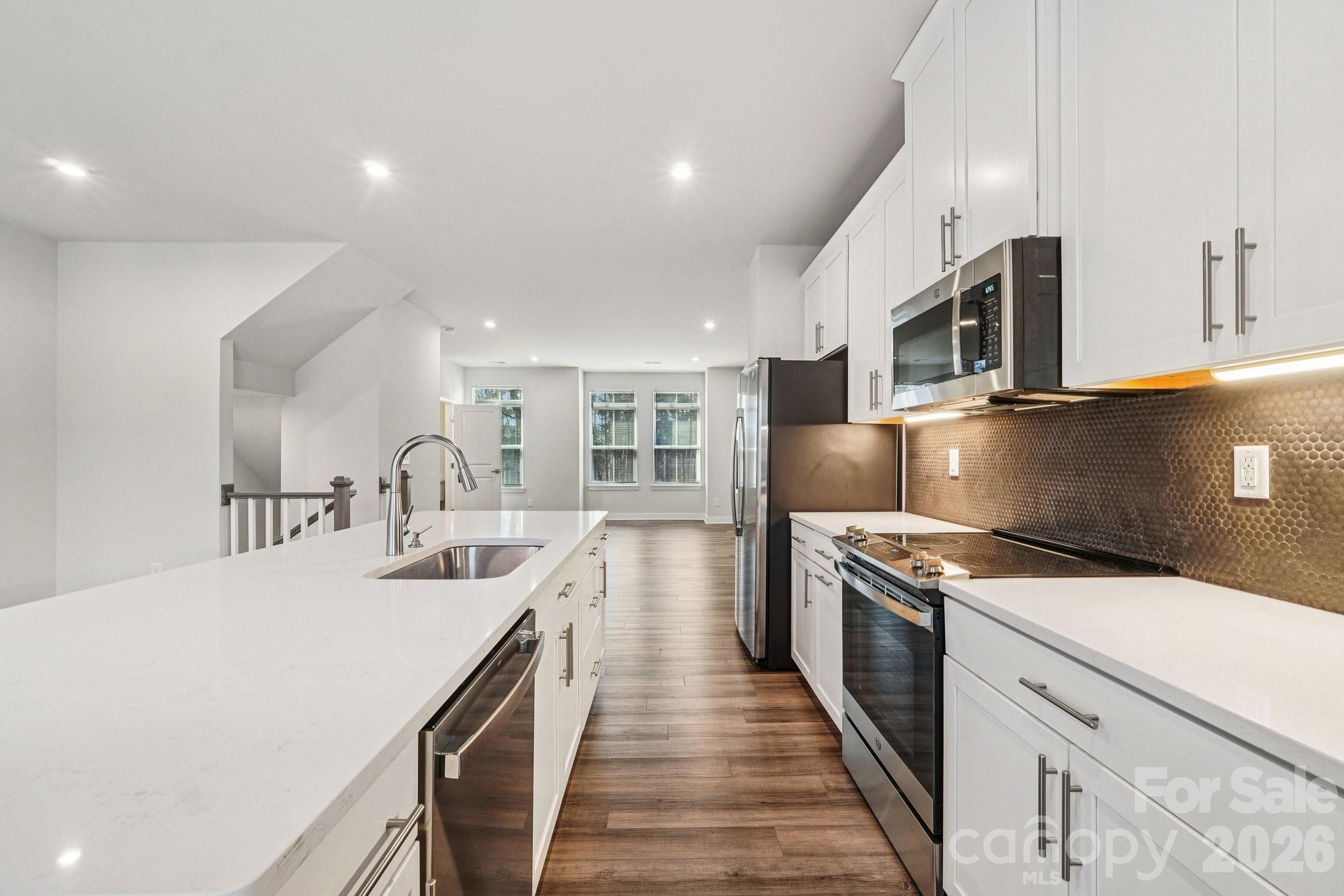 Welcome to the perfect home in Wendover Green! Ideally positioned directly across from a 1-acre wooded park, this townhome offers green space without sacrificing location. The rare combination of tree-lined views from your living room, yet just minutes from Uptown, Cotswold, Plaza Midwood, and so much more.

This thoughtfully designed open concept floor plan includes one of the few side-by-side 2-car garages in the community and is filled with upgrades throughout! Hardwood stairs, a spacious chef-style kitchen with a massive island, and stainless steel appliances—perfect for both everyday living and entertaining.

Wendover Green delivers true community living complete with a private dog park, nature views, and a welcoming neighborhood atmosphere—all in a location you’ll never want to leave. 

ASK ABOUT OUR 1% lender-paid credit with our preferred lender!