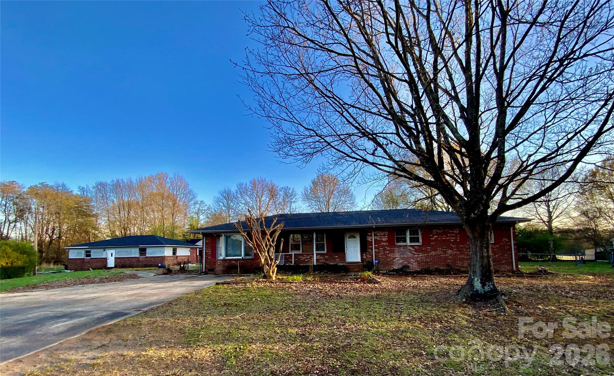 Opportunity awaits! This 3 bedroom, 2 bath home sits on a spacious lot and offers incredible potential for renovators or buyers looking to create their dream property. The home and additional structures are in need of repairs and are being sold as-is, making this an ideal project for those with vision. The property features a large detached building (aprox.1,026 sq ft) along with an additional storage building-perfect for a workshop, hobby space, or future conversion. The possibilities are endless for a multi-use property.