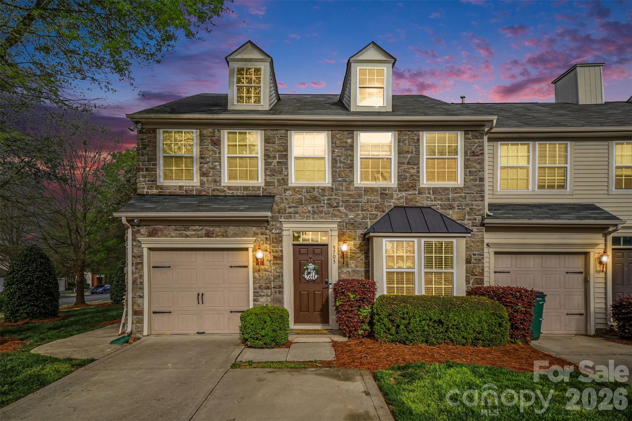 **1/0 BUYDOWN LENDER INCENTIVE BEING OFFERED TO BUYERS!**

If you're looking for amenities and convenience, this is the home for you! The Berewick community amenities are a true standout and this home sits right across from them. Seriously - walk across your street to a pool, a clubhouse, a sand volleyball court, basketball courts, a huge playground, and a splash pad all just steps away so it feels like an extension of your own home. There’s even an accessible parking area that makes hosting easier when you have guests over and need space for them to park. PLUS, all of this is just around the corner from an established but still growing dining/shopping/entertainment space at Berewick Town Center (and Charlotte Premium Outlets) and just minutes away from I-485 and I-77 for accessible commuting.

But let's not forget the house itself...it is a standout in the community with MANY upgrades over the years. This 3 bedroom, 2.5 bathroom stunner is THE end unit to see! You get the benefit of extra light inside and more usable space outside. Walk in and you’re greeted by a dining area that can flex however you need it - a formal setup, office, or an additional living space. From there, the layout opens up and flows naturally into the beautiful living room and sunroom, giving you room to spread out without feeling disconnected. Built-in speakers run throughout the home, making it easy to set the tone whether it’s a quiet night in or having people over for the game.

The kitchen is setup to be used, not just looked at. Granite counters, functional prep space, plenty of natural wood-tone cabinetry, a gorgeous tile backsplash, plus a new oven and dishwasher already in place!

Upstairs keeps things practical. Laundry where you want it, bedrooms with comfortable space, and a primary suite with a tray ceiling, soaking tub, and a custom closet that actually helps keep things organized.

Out back is where this one separates itself. Being an end unit gives you extra yard space that most don’t have. There’s room to grill, set up a fire pit, let kids or pets play, or just enjoy having a little more breathing room.

Don't miss your chance to see this gorgeous home today!