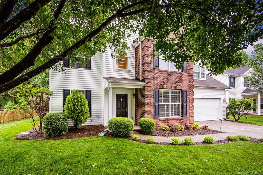 You'll fall in love with this beautiful home with it's welcoming entrance and wooded backyard! Main level features a two-story foyer, office, eat-in kitchen with beautiful granite & clean white cabinets, hardwood floors in foyer, kitchen & hallways. Second floor features balcony walkway, large master bedroom with vaulted ceiling, master bath with dual sinks & walk-in closet, HUGE bonus room that is wired for surround sound. Close to Lake Wylie & shops at Rivergate! Fridge, washer & dryer convey!