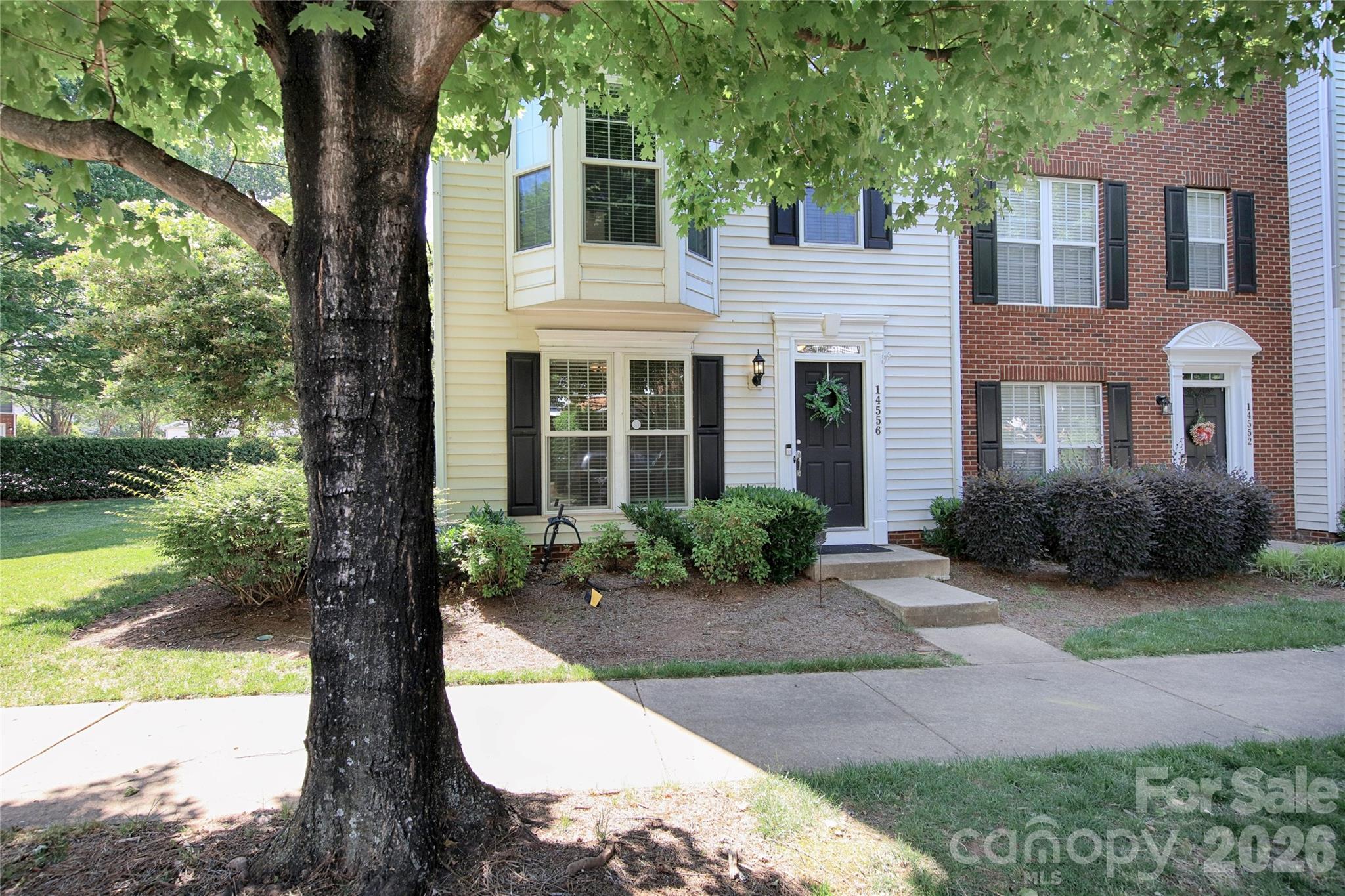 Location, Location, Location.  Rare opportunity to own this beautiful end Unit Townhome with 3 Bedrooms, 3 Full Baths and 1 Half Bath in the sought after Rosedale neighborhood.  This house has been meticulously maintained and updated.  New Windows throughout the entire townhome, Beautiful totally remodeled Primary Bathroom, New Carpet 2024, Interior Paint 2024, Upgraded Secondary Bathrooms, New Light Fixtures and finished Drywall in Garage. Townhome is located in a truly walkable community.  Just steps away from grocery, shopping, dining, hospital and walking trails. Main level features a secondary bedroom, full bath, laundry/mud room and 1-Car garage.  2nd floor features a large Open plan living room, kitchen and breakfast area with lovely bay window and lots of natural light.  Step outside and enjoy day or nighttime on the extra-large deck overlooking green space. Too much sun, or rain, not a problem, enjoy the convenience of the retractable awning making it useable year-round. Third floor features the large primary suite with gorgeous, remodeled bathroom and walk in closet.  2nd bedroom is extra-large with extra-large closet.  This townhome has it all.  Super convenient to I-77, downtown Charlotte and Birkdale. Schedule your showing today!