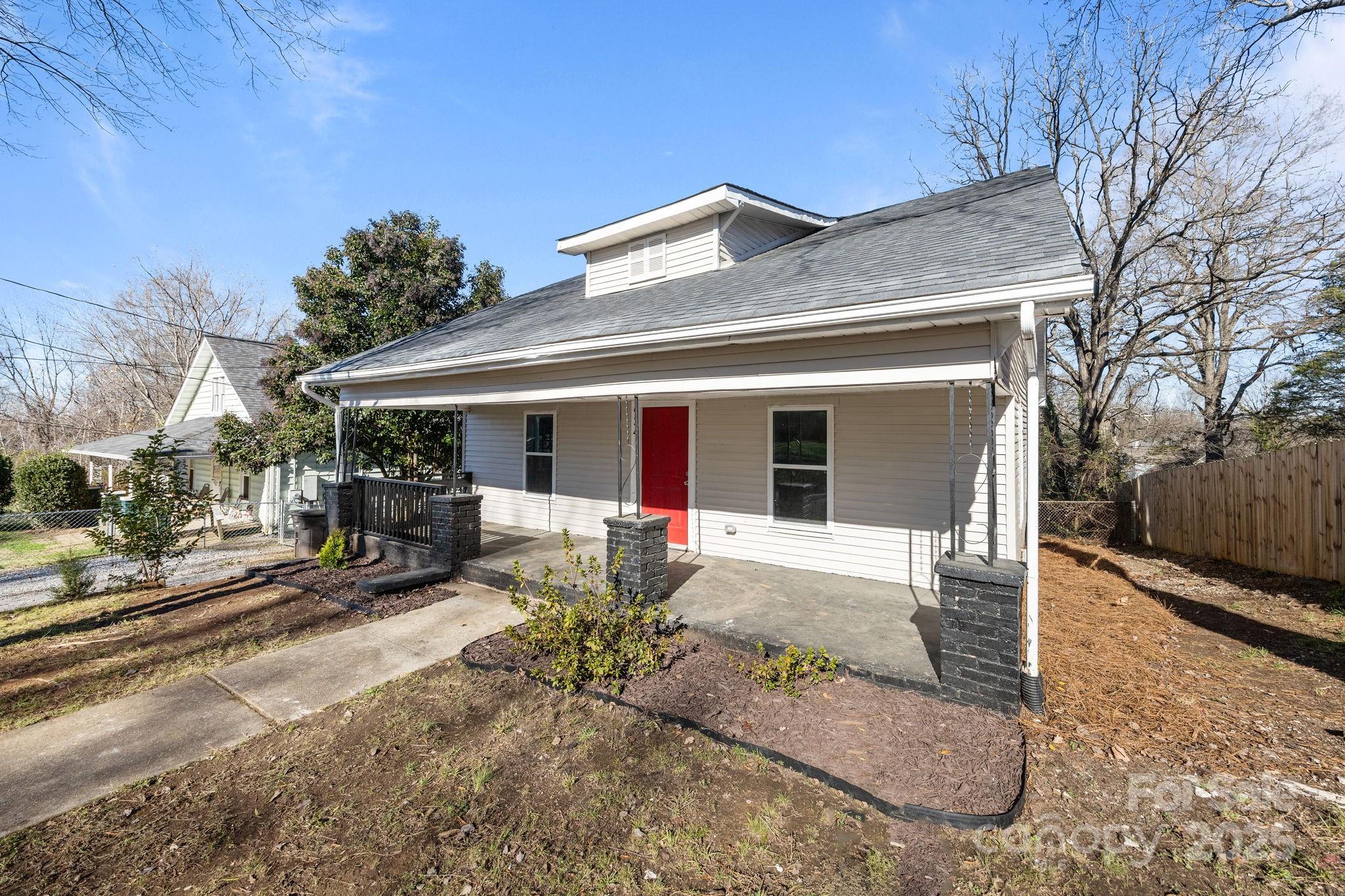 Discover this beautifully updated 4-bedroom, 3-bath home, just minutes from downtown Statesville. Step inside to an inviting open-concept floor plan that seamlessly connects the living room, dining area, and kitchen—perfect for both everyday living and entertaining. The kitchen features brand new stainless steel appliances, cabinets and countertops! 

Enjoy the convenience of a first-floor primary bedroom with private attached bath, along with another full bath just off the laundry/mud room, and a secondary bedroom at the front of the home. Throughout the home, you'll find stylish and durable LVP flooring, adding a modern touch and easy maintenance. Upstairs, you have two more bedrooms and an additional full bath. 

Located only moments from I-40, I-77, and Highway 70, this home offers exceptional access for commuters while keeping you close to all the amenities Statesville has to offer. Move-in ready and freshly updated, this property is a must-see!