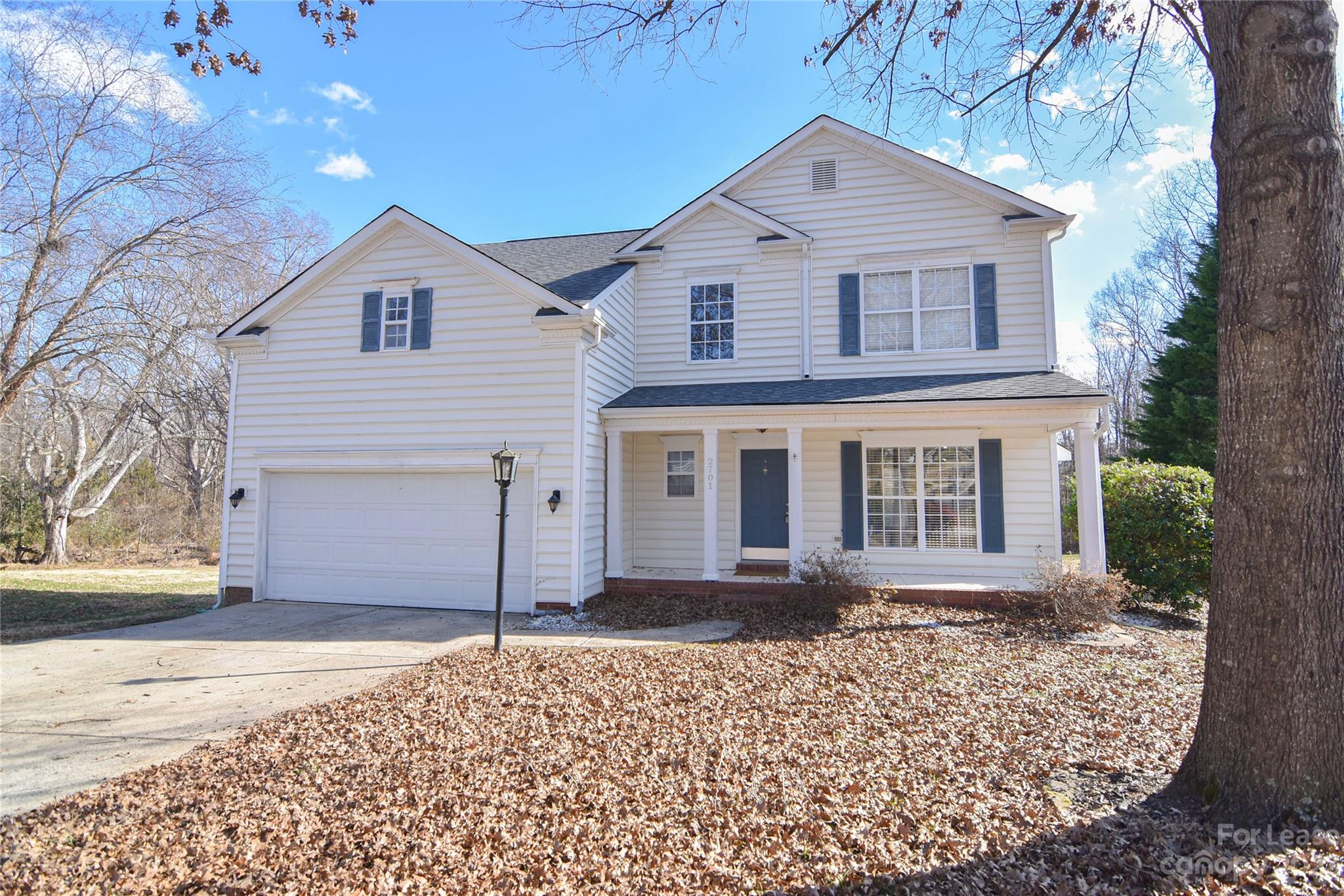 Beautiful two story home, cul-de-sac lot situation on almost half an acre in the Robyn's Glen Community. Upon entering you will be  greeted by a 2 story foyer & gorgeous hardwoods. Home features a large kitchen with stainless steel appliances, tile backsplash and tons of cabinet & counter space. Just off the breakfast area is a spectacular sunroom that overlooks the back deck along with a wooded view. Up stairs you will find the huge primary suite with vaulted ceilings and en suite bath with tiled walk in shower. The bonus room or potential fourth bedroom has an awesome addition of office space with barn doors and luxury vinyl plank flooring. Have your own outdoor oasis just steps away in the backyard with paver patio and fireplace perfect for entertaining. located near Concord Mills , 485 and tons of restaurants and retail.