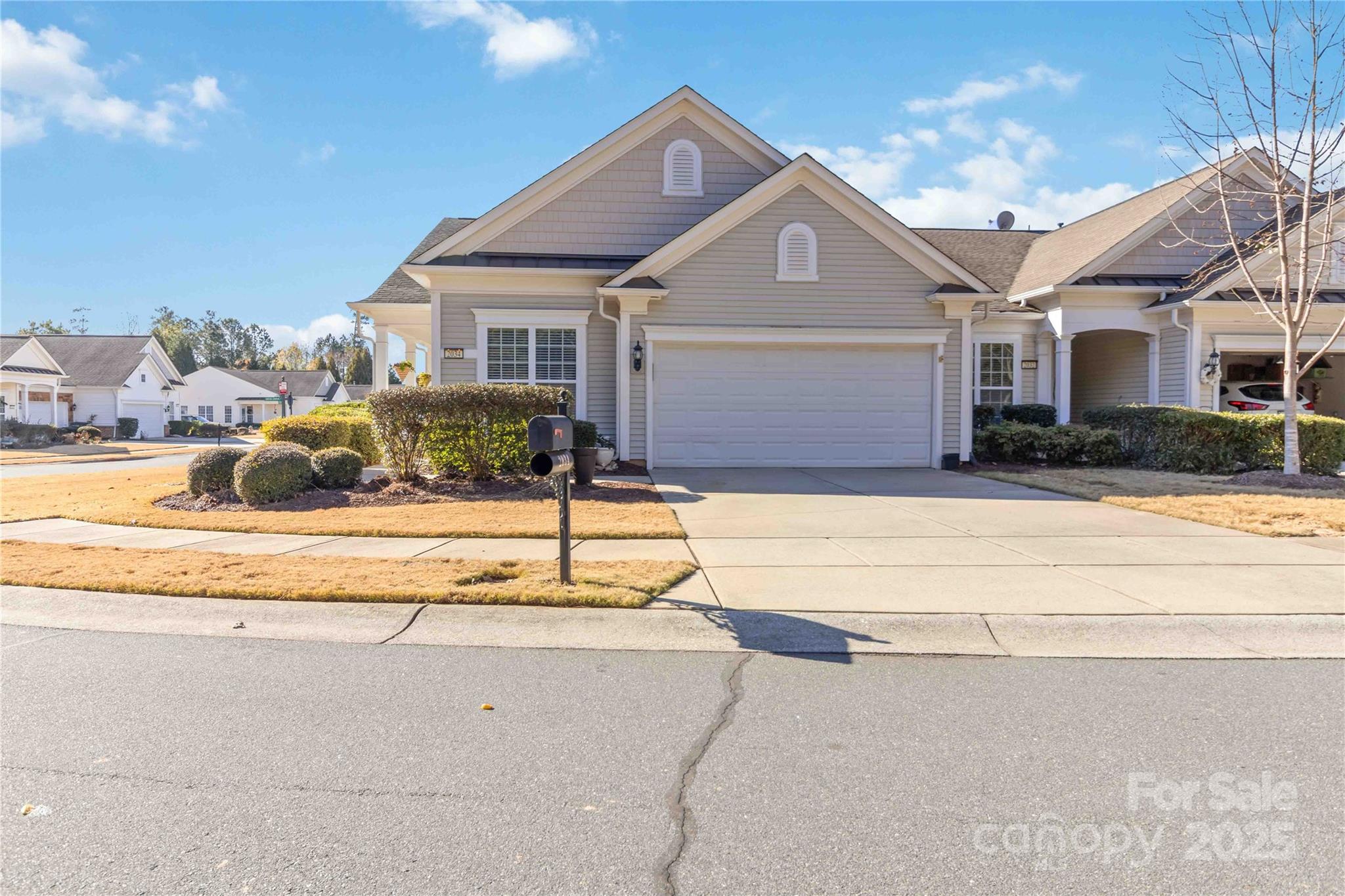 Discover effortless living in this sought-after end-unit villa located in the vibrant Sun City Carolina Lakes community, designed for adults seeking a resort-style lifestyle. This move-in-ready home features an open-concept great room with seamless flow to the kitchen and dining area—perfect for relaxing or entertaining.

The kitchen is equipped with stainless steel appliances, including a refrigerator, microwave, and dishwasher. The spacious primary suite includes a large en-suite bathroom with a double vanity, a tiled walk-in shower, and an oversized walk-in closet. The guest bedroom and bath offer comfort and privacy for visitors.

Recent upgrades include a new AC system with air purification and freshly finished epoxy floors in the garage.

Enjoy a wealth of amenities within the community—an impressive clubhouse, golf course, fitness center, indoor and outdoor pools, tennis and pickleball courts, trails, and endless social activities.

Experience the lifestyle you’ve been waiting for at Sun City Carolina Lakes—where every day feels like a getaway.
