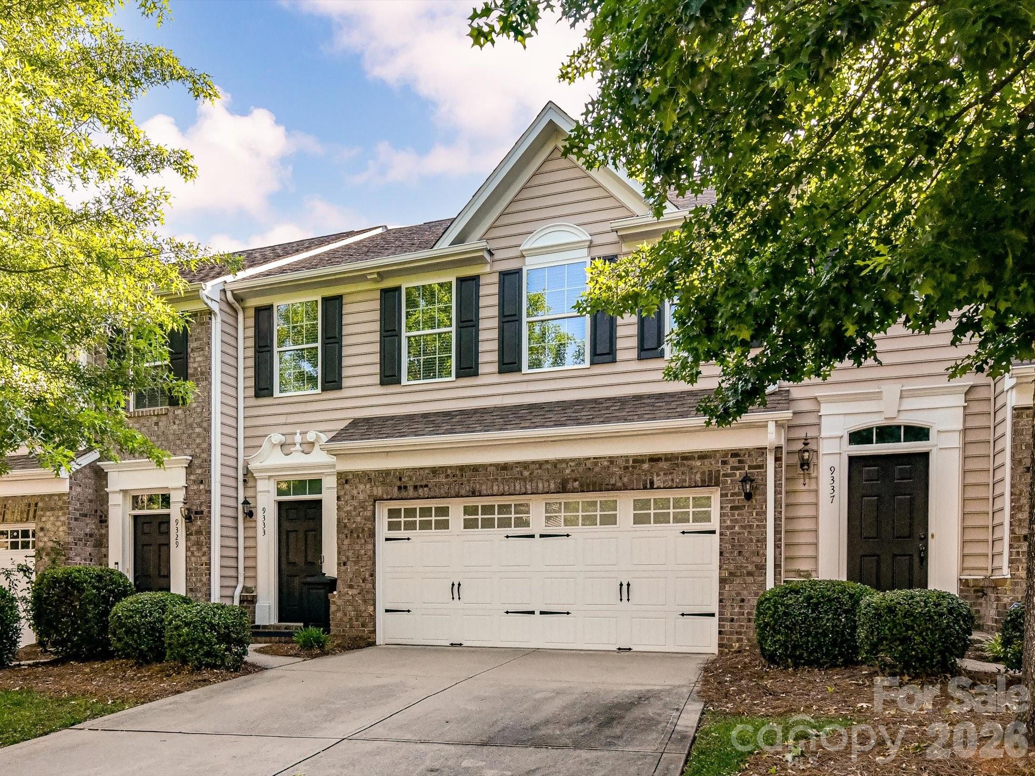 Welcome home to this one owner move-in ready 3 BR, 2.5 bath townhome in the desirable McCarley community of Ballantyne! Freshly painted throughout with brand-new carpet upstairs, this move-in ready home offers a bright, inviting interior and low-maintenance living. The functional floor plan features comfortable living spaces with an open layout on the main level, while the enclosed backyard provides the perfect spot to relax, entertain, or enjoy a little extra privacy. Lovely wood floors on the main level with great natural light.  A spacious primary suite upstairs features a tray ceiling and a large walk-in closet. The primary bath features a walk-in shower, dual vanities, a large soaking tub and a separate water closet.  Two additional bedrooms, a second full bath and a nice sized laundry room complete the upstairs.  A spacious 2-car garage adds convenience and ample storage, and the new tankless water heater (2023) offers modern efficiency and endless hot water. The owner installed a water filtration system in 2018. Refrigerator, washer/dryer and filtration system to convey.  Ideally located just minutes from The Bowl at Ballantyne, shopping, grocery stores, dining, and I-485, you'll enjoy easy access to everything Ballantyne has to offer. Don't miss this opportunity to own a well-maintained townhome in one of South Charlotte's most sought-after locations!