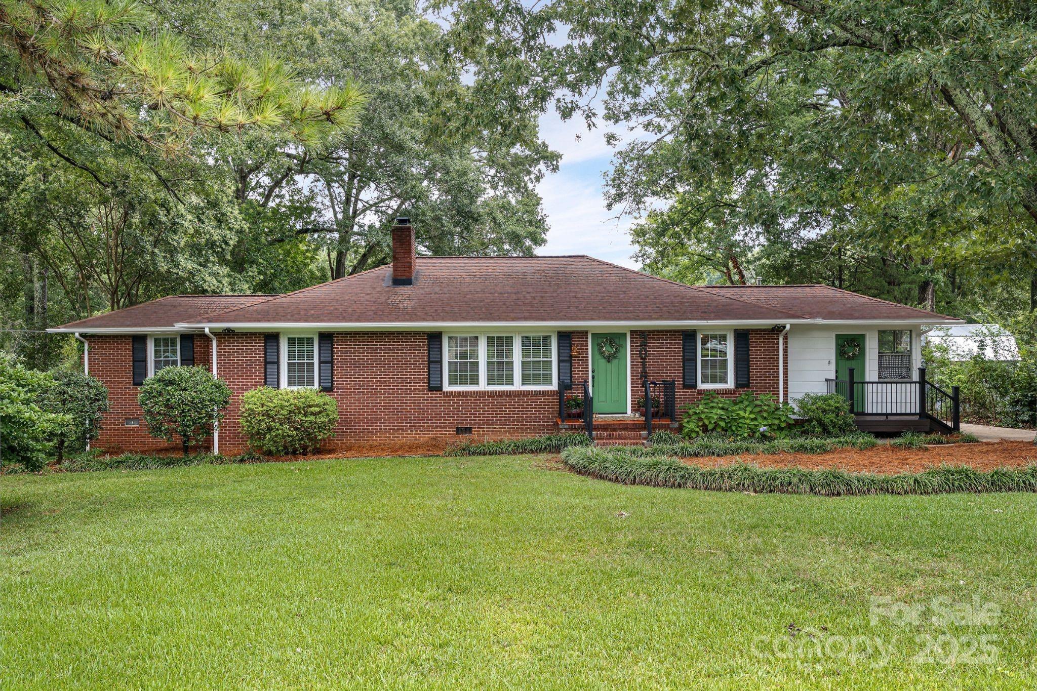 SO much character and charm - This beautifully maintained and recently updated 4-bedroom, 2-bath home sits on nearly half an acre with a fully fenced yard and NO HOA. Inside, you'll find fresh updates and thoughtful touches throughout. The washer, dryer, and refrigerator are all included, making your move even easier. The laundry area offers flex space that can be used as a mud room, office or sunroom. Detached 2-car garage offers additional space with electrical setup—ideal for a workshop, storage, or hobby area. Enjoy peaceful living with convenience just minutes from shopping, dining, and interstate 77 & downtown Rock Hill. Listing agent holds ownership of this home and welcomes all buyers and agents for showings!
