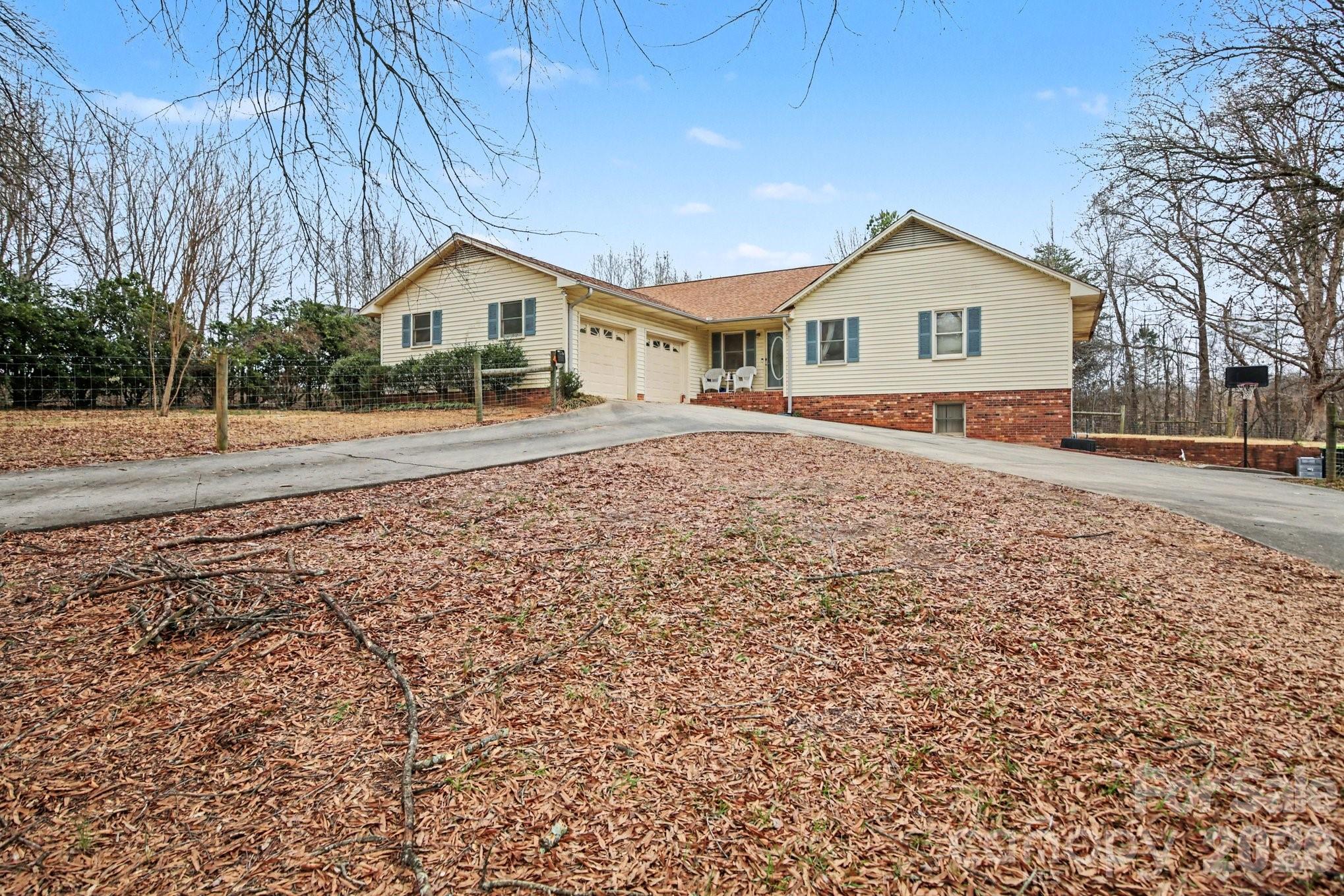 Situated on 1.28 acres with no HOA, this spacious ranch with a finished basement is packed with potential and presents an excellent opportunity for investors, renovators, or buyers looking to build instant equity. Offering 5 bedrooms and 3.5 bathrooms between the main level and basement, this property provides the space and flexibility that today's buyers are seeking.

Major system updates have already been completed, including an HVAC system with central air and plumbing improvements in 2021, allowing the next owner to focus primarily on cosmetic updates and personal touches. The home also features a screened sunroom, deck, electric fenced yard, storage building, and plenty of outdoor space to enjoy.

Whether you're looking for your next flip, a long-term rental investment, or a property to customize into your dream home, this one has tremendous upside. With solid bones, generous square footage, over an acre of land, and no HOA restrictions, opportunities like this don't come along often.

Property is being sold As-Is. Schedule your showing today and discover the potential for yourself.
