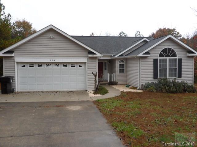 Three bedroom, two bath vinyl sided ranch style home on cul-de-sac street. Vaulted ceilings in living room & 1 bedroom. Freestanding gas fireplace in living room. Whirlpool tub in master bath.  Double garage. All appliances stay. Secluded neighborhood but close to downtown Rutherford College and I-40. Connelly Springs mailing address but is located in Rutherford College town limits.
