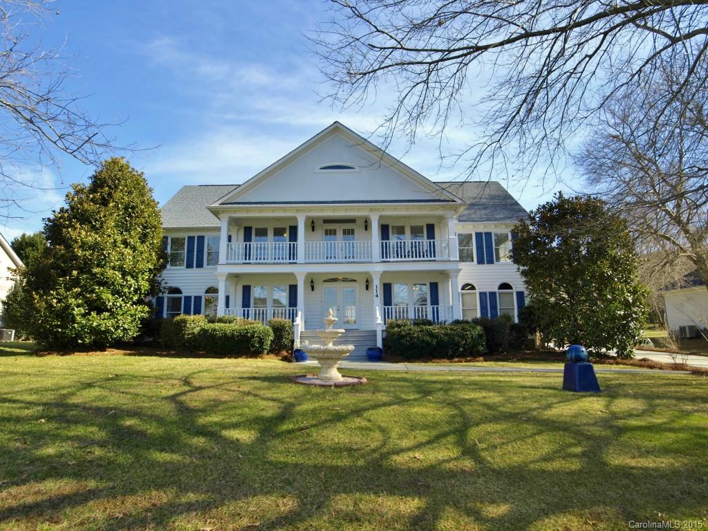 Beautiful Charleston style home located in small lake front community of custom homes on Lake Norman.  True year round water views w/ your deeded boat slip less than 500' from front door. Community recreation area w/ beach & picnic area. Large 3 bedrooms plus office/den w/French doors. 2 story great room. Gourmet kitchen w/ granite counters opens to a sunny, bright breakfast area. English garden backyard w/ private gazebo and second story sun deck. 3 car garage w/large workshop area and storage.