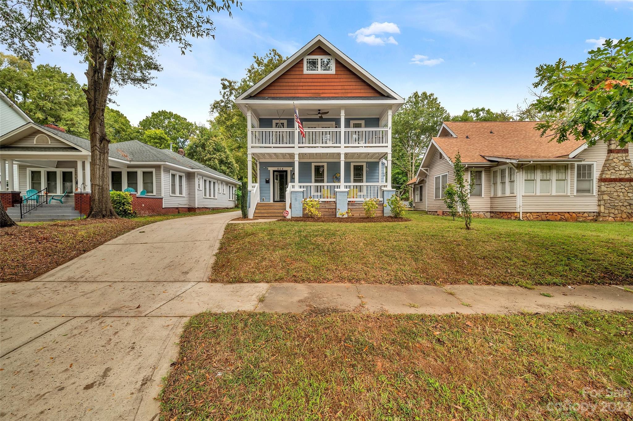 Welcome home! This beautiful 3 bed, 2.5 bath Charleston, style-home in North End is centrally located in the Lockwood neighborhood, just minutes away from Camp North End, Optimist Hall, the Music Factory, Uptown and many local favorites. Inside this two-story gem, boast an open floor plan with beautiful hardwood floors, crown molding throughout, gas fireplace and lots of great storage. Past the main living and dining area, is your modern kitchen complete with stainless steel appliances, a cute breakfast nook, and half bath. Upstairs holds a full bath and three bedrooms including the spacious, primary suite with a nice-walk in closet, primary bathroom with soaker tub and separate shower. Step outside onto one of two front porches and enjoy a view of the Uptown skyline. You can also enjoy a fresh cup of coffee on your main level front porch or for a more suburban-like privacy, entertain in your fully, tall fenced backyard with cedar trees on your new deck or by the fire. This won’t last!