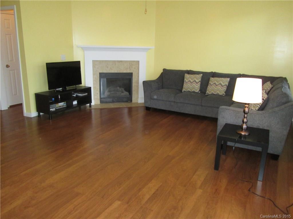 Convenient location. Walk to restaurants and shops. Whole house with 5" laminate flooring, except staircase. Refrigerator, washer, dryer will remain. Private patio w/ extra storage.