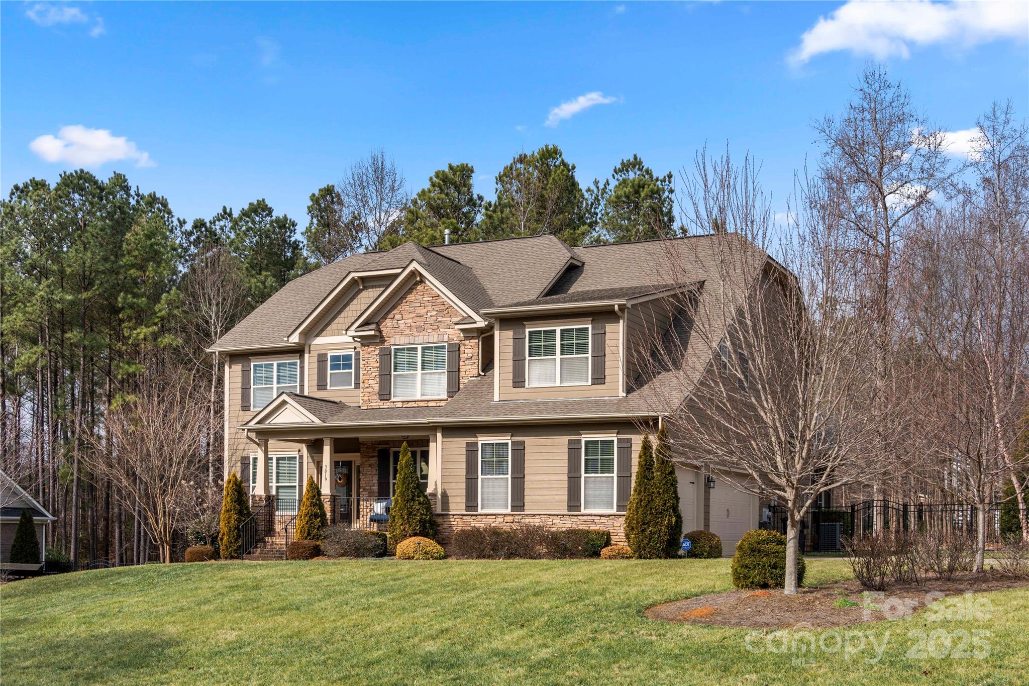 Welcome to your dream home on a serene corner lot, where spacious living meets exquisite design. The first floor features a second primary bed and bath, complete with a garden tub, shower, dual vanities, and generous closets. Enjoy outdoor living with a screened-in porch, two expansive decks, and a charming built-in firepit. The chef's kitchen is a true delight, showcasing dual ovens, a farmhouse sink, and premium appliances, along with a convenient walk-in pantry. Elegant details, including coffered ceilings and a stunning kitchen island with Quartz countertops. Upstairs, the Primary suite offers a lavish bathroom and an oversized walk in custom closet, along with a versatile flex space. Three additional spacious bedrooms, each with private baths, provide comfort for all. This beautiful home has a 3 car garage with epoxy flooring, and a large backyard, perfect for gatherings.