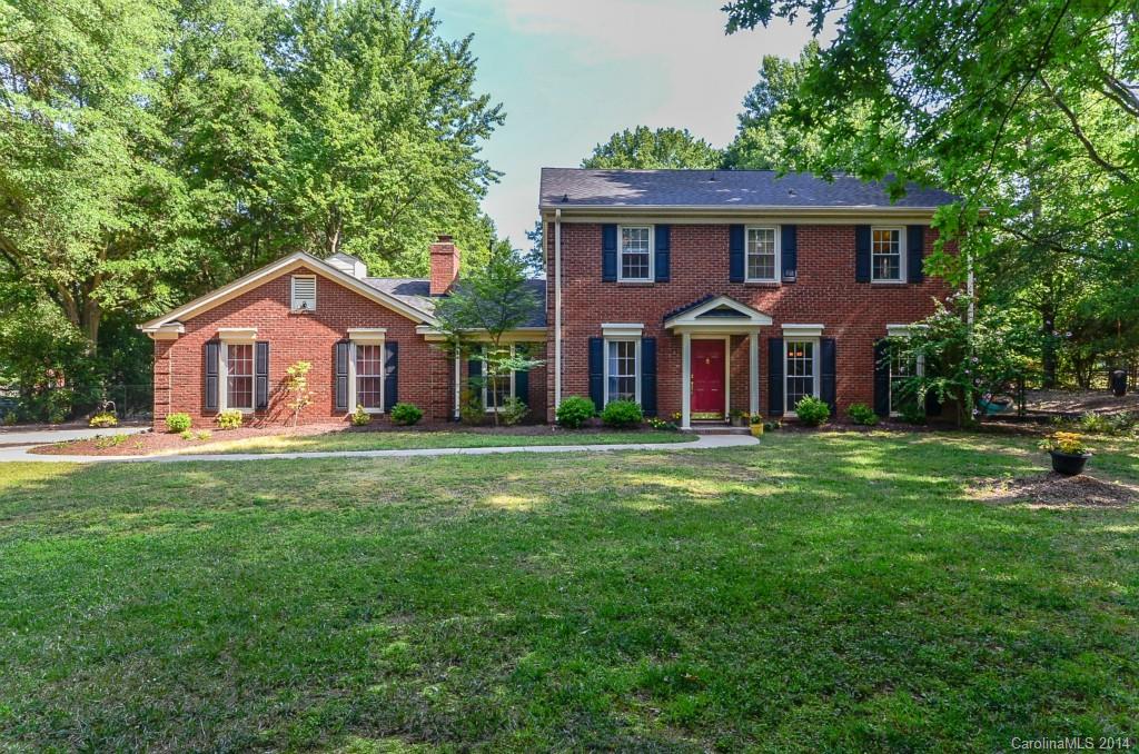 Traditional Southern Charm in this 2 story brick home.  PRICED BELOW APPRAISAL!!  Many upgrades:  Kitchen cabinets, granite counters, appliances, tile floors, new carpet, bath vanities, tops and fixtures, windows, water heater, roof and so much more! The huge backyard boasts a patio, sandbox and tire swing!  Live the South Charlotte lifestyle in the heart of Ballantyne on a private, fenced .73 acre lot.  Close to the YMCA. Quiet, private and close to everything!  1 year APHW included.