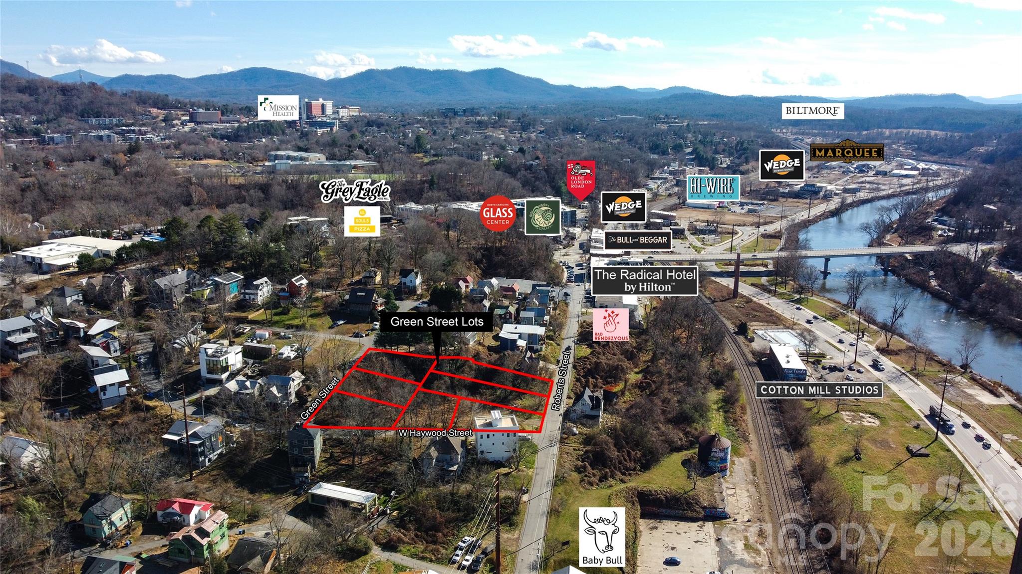 Seize this rare chance to secure a prime parcel on Chicken Hill, featuring seven contiguous building lots zoned RM-8 with water and sewer in place, and boasting an elevated position directly above the River Arts District (RAD). Enjoy unmatched walkability to the best of the RAD’s scene, including the new Radical Hotel, Wedge Brewery, Hi-Wire Brewing, the scenic RAD Greenway, and the vibrant community of hundreds of working artists.