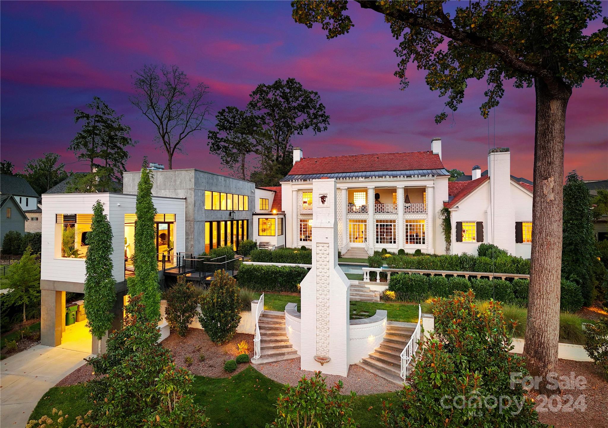 Seamlessly blending historical elegance with modern luxury! Welcome to this meticulously restored Barnhardt-Cramer Estate, a 1.05-acre haven in Midwood's Cramer's Pond. Originally owned by cotton magnate Charles Barnhardt, the Colonial Revival masterpiece was designed by architect Martin E. Boyer Jr. in 1939. In 2019, Mermans Architecture & Grandfather Homes collaborated on the extensive renovation to combine traditional aspects with modern elements. The vibrancy of the original design and the possibilities of renewal was captivating, but also an endured labor of love. The 2-story modern addition is a striking contrast to the original design but thoughtfully blended with openness. The 3-year process was permitted through the Historic Landmarks Commission. Once fully completed in 2022, the home was awarded Axios Charlotte’s 2023 Home of the Year. This unique opportunity is ready for its next owner to enjoy the convenient location and view of Uptown Charlotte’s skyline from this beauty!
