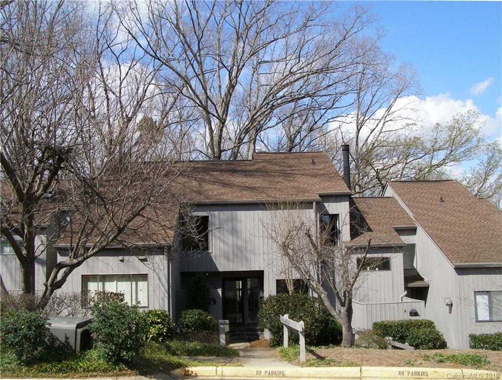 You won't feel cramped here! Spacious condo has versatile floor plan that features 2 story GR w/FP, skylights & deck w/views of the lake! Updated Kitchen w/granite, ss appl. Use front room as Office/Den. Enjoy wooded views from DR & Sun Rm. Upstairs has 2 Master Suites,one w/large dressing/sitting area, 2 full baths. LL has 2 sizeable BRs, full bath and another Den/Office currently used as an exercise room, PLUS your own private Sauna! Patio. New front windows. Walking trails out your back door.