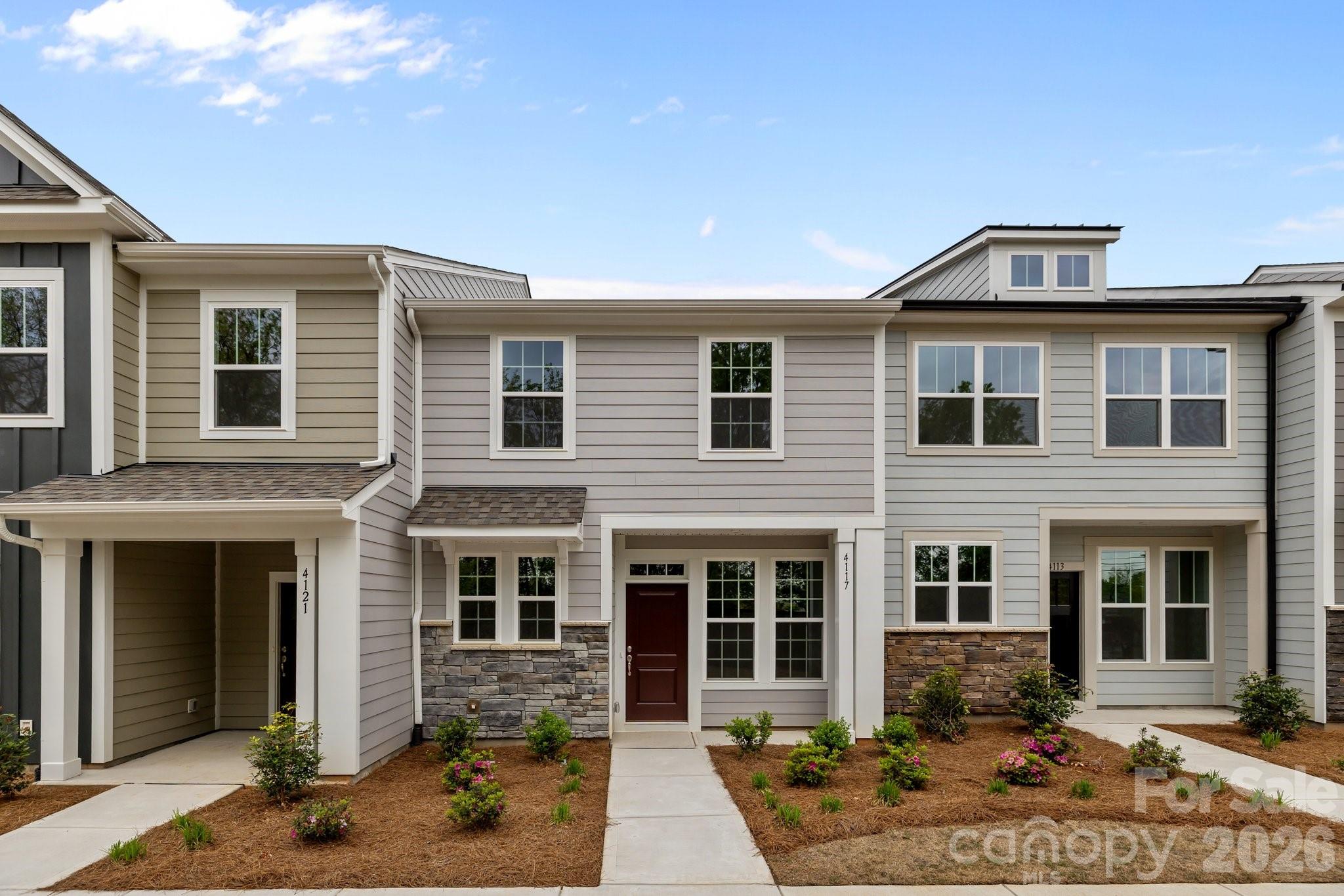 The LAST Rochester! FINAL OPPORTUNITY 

Construction will start this summer! This Rochester plan townhome has an estimated Fall 2026 completion in Greenway Overlook, a boutique 58-townhome community in Charlotte, NC. This 3BR / 2.5BA home with a 1-car garage offers modern design and practical spaces less than 10 minutes from Uptown Charlotte and Wesley Heights.

The main level features an open-concept layout with luxury vinyl plank flooring. The kitchen includes quartz countertops, stainless steel appliances, a spacious island, and an approximately 12' deep finished storage closet—ideal for pantry or utility use. A bright dining area and connected family room make the space inviting for both daily living and entertaining.

Upstairs, the Rochester plan offers three bedrooms, two full baths, and a convenient laundry closet. The primary bedroom and bathroom has dual vanities, and a large walk-in closet. Secondary bedrooms provide flexibility for work-from-home, guests, or hobbies.

Greenway Overlook offers quick access to South End, NoDa, shopping, dining, parks, greenways, major highways, and Charlotte Douglas International Airport. HOA services cover water, sewer, trash removal, lawn care, and landscaping, supporting a low-maintenance lifestyle in a central Charlotte location.