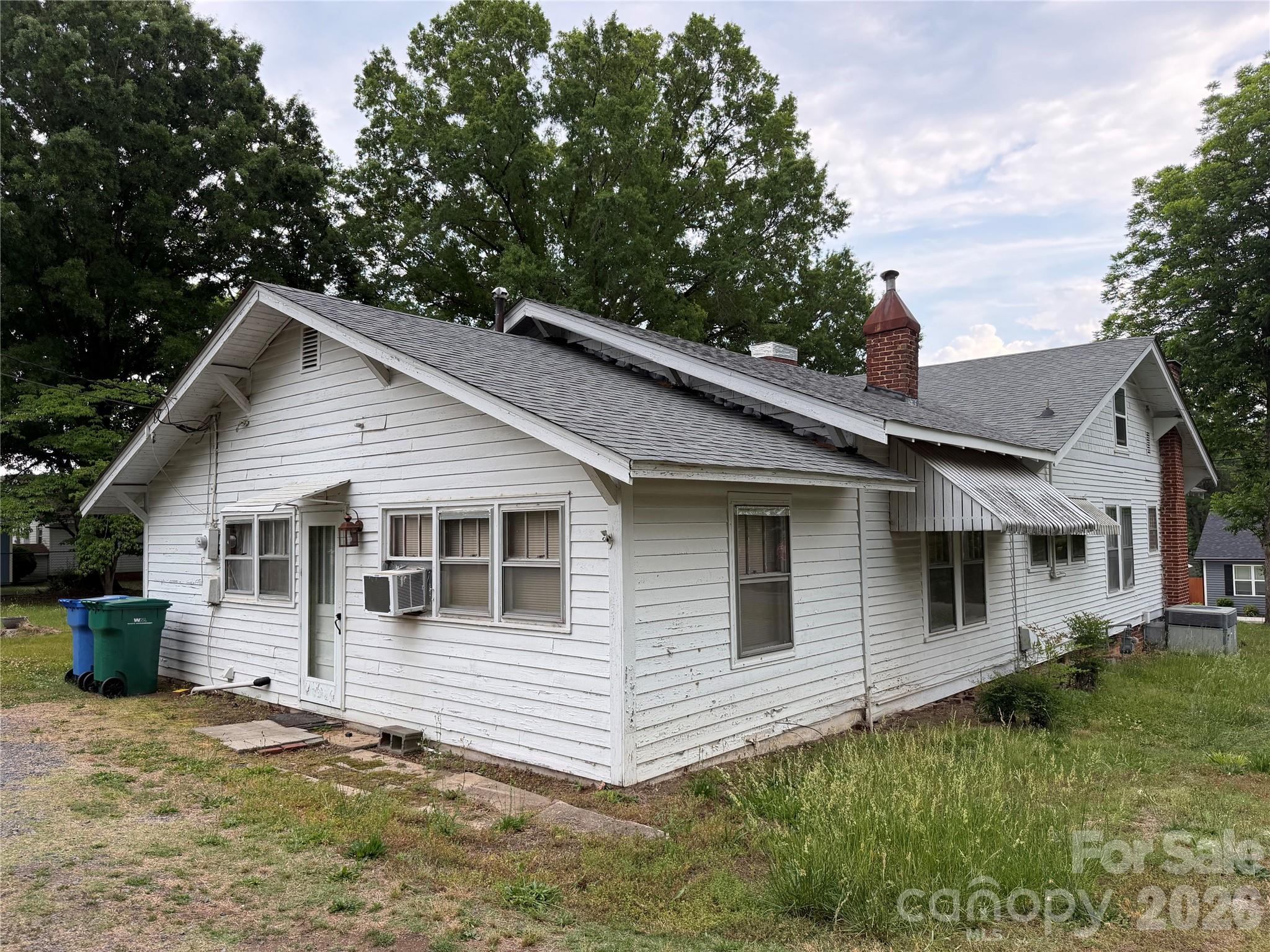 Home needs some updating but is in good livable condition. Selling AS-IS.

This lot was recently subdivided and will NOT include the side or back lot. See survey attached in pictures.