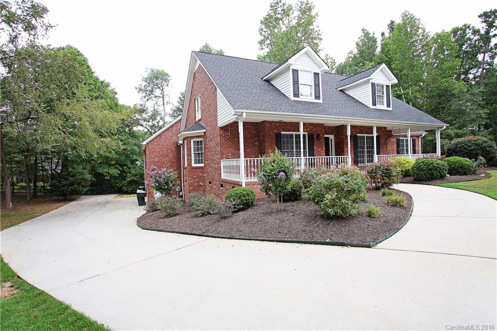 Don't miss this rare find! Full brick cul-de-sac home on nearly an acre within a few miles of I-77, and no HOA's. Lg kitchen open to family room, spacious bonus room with wet bar, screened porch, wooded lot, oversized master bedroom with trey ceilings, master bath with garden tub, glass shower, and dual vanities. Walk-up attic is plumbed for a full bath and ready to finish. 2 car garage and workshop in basement. Roof is approximately 4 years old and HVAC is less than 6 years old.