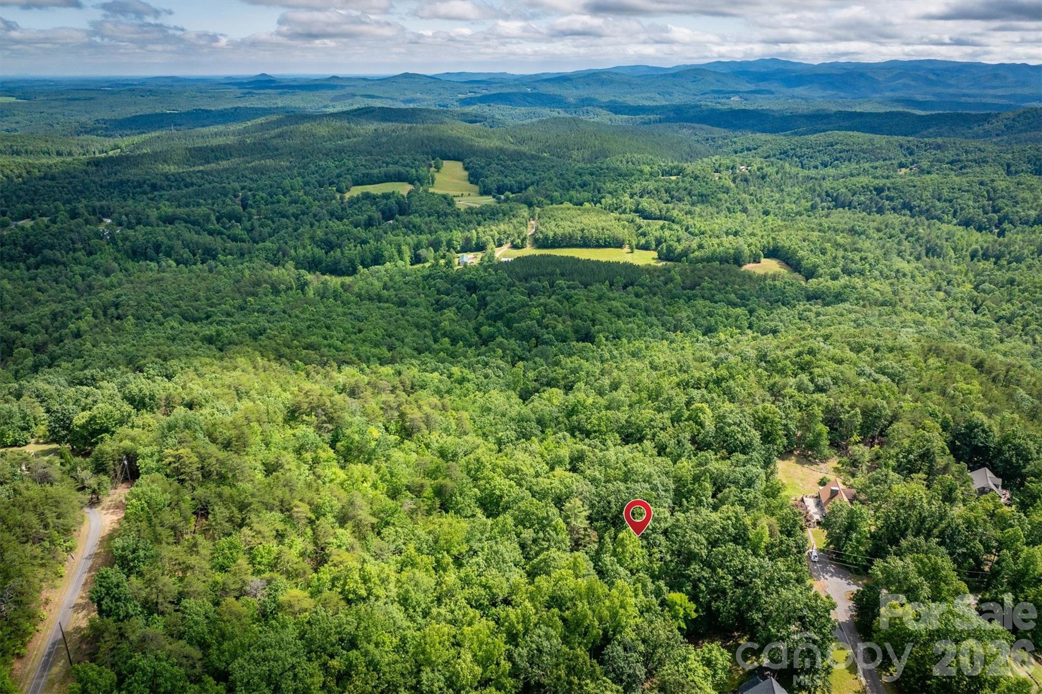 Don’t miss your chance to own a slice of Mineral Springs Mountain - 1.24 Acres in Burke County, NC  Located in the west-central NC mountain region. Discover the potential of this wooded lot located on picturesque Mineral Springs Mountain. Build your dream home, second home, short-term rental, long-term rental, log cabin or what ever your dreams are made of - this is the one - Offering long-range views, this private parcel is the perfect site.  Property Features: Gently sloped, wooded terrain, Quiet and peaceful setting.  Just 10 minutes to Hwy 40; 35 minutes to Hickory, Lenoir, and min away from Lake Access.  The Mountain borders Valdese and Connelly Springs.
Utilities & Fees (per Burke County): Water tap connection: $1,500.  Water account setup: $150
Electricity and other utilities will need to be installed.