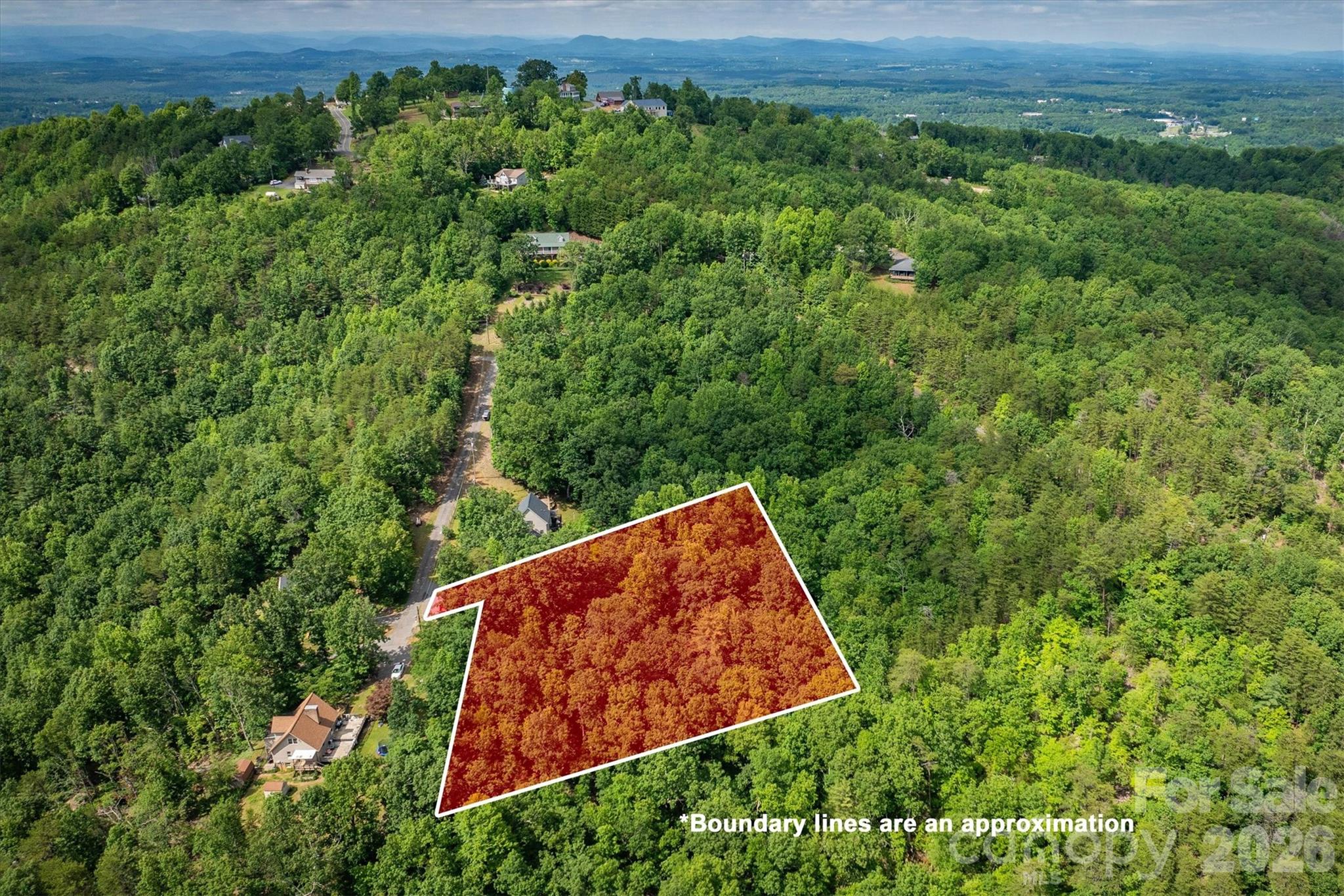 Your mountain escape, listed at tax value- - - - - - - 1.24 acres on Mineral Springs Mountain in Burke County, NC — offering long-range views, wooded privacy, and the freedom to build exactly what you've been dreaming of; Single-family, stick-built, or modular construction all welcome.   Restrictions: No manufactured homes.  Whether you're envisioning a primary residence, second home, log cabin, or short-term rental investment — this parcel gives you the canvas.

Mineral Springs Mountain borders Valdese and Connelly Springs. The property's views and wooded terrain create a quiet, peaceful setting that's surprisingly close to everything. Just 10 minutes to Hwy 40, your access to Hickory, Lenoir, Morganton, Hwy 321, and Hwy 70.   Castle Bridge Boat Access-3101 Connelly Springs Rd, Valdese, NC is a 15-minute drive, located centrally along Lake Rhodhiss, featuring 6 boat ramps, parking, and fishing. 

Utilities (Burke County): Water tap connection $1,500 · Water account setup $150. No minimum building size restrictions.