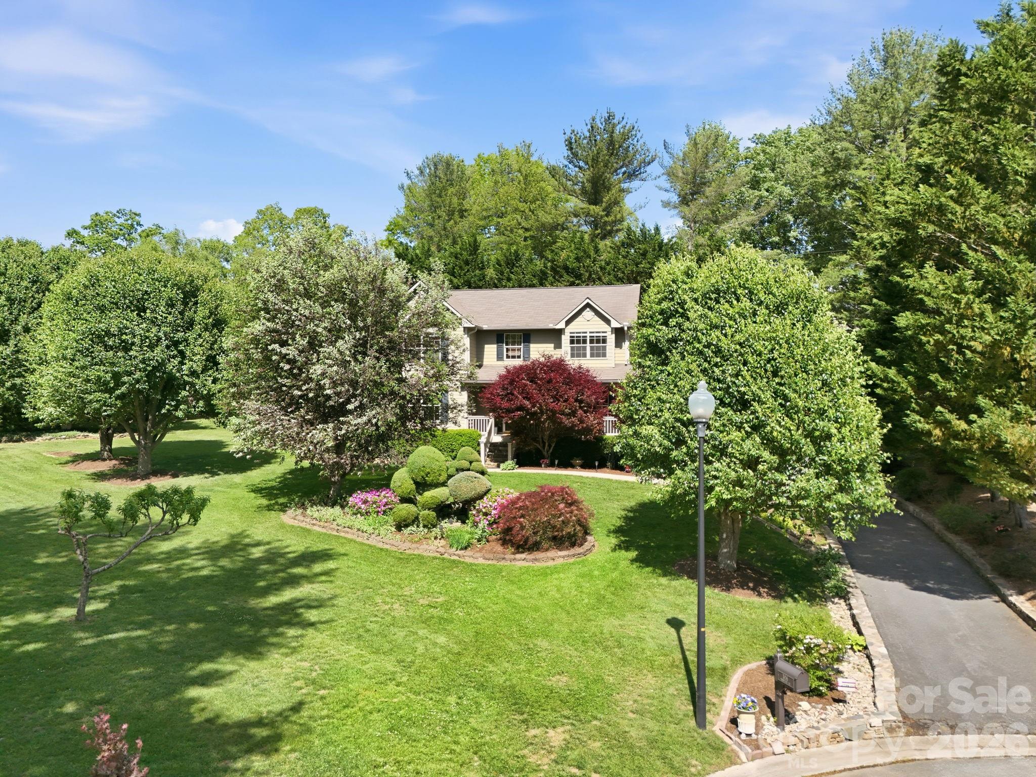 Welcome to this beautifully maintained 4-bedroom, 2.5-bath home nestled on a quiet cul-de-sac in the highly desirable Southbrook neighborhood. This inviting property offers comfort, space, and convenience in one exceptional package. Step inside to discover a flowing main floor filled with natural light and a thoughtfully renovated kitchen featuring modern finishes ideal for both everyday living and entertaining. The home’s layout provides a warm and functional flow, making it easy to feel right at home and unwind. Outside, enjoy a meticulously landscaped yard that creates a peaceful setting for relaxing or hosting gatherings. The large unfinished basement offers endless potential- whether you envision a home gym, workshop, or additional living space. Located just minutes from all that South Asheville has to offer, including shopping, dining, and top-rated amenities, this home truly has it all. New water heater 5/2026.