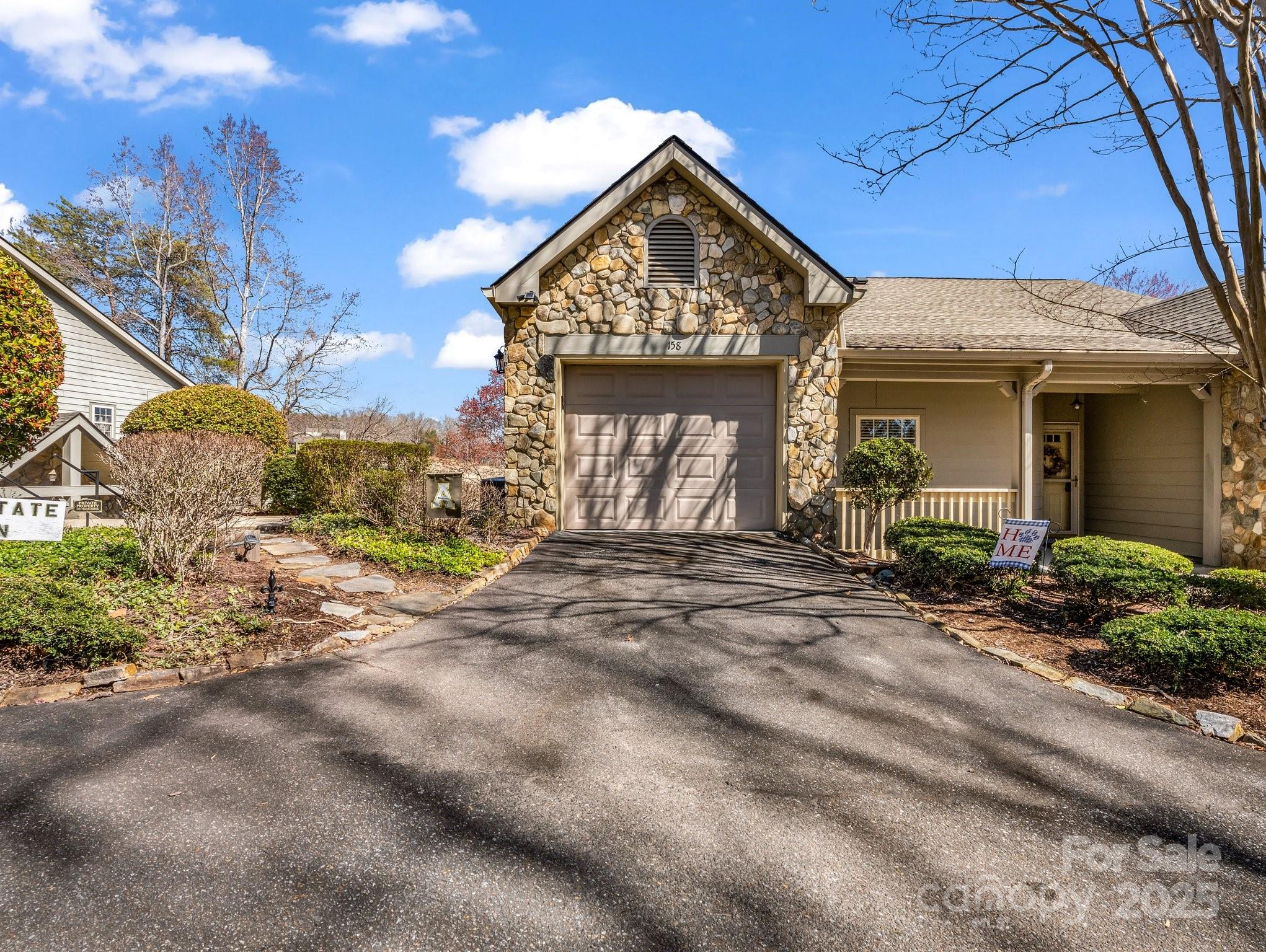 Discover the perfect blend of comfort and convenience in this end-unit STONECREST CONDO with 1 car garage. Nestled in the heart of Rumbling Bald on Lake Lure, overlooking the Apple Valley Golf Course, this charming 2BR, 2BA condo offers a split-bedroom floor plan for added privacy. Stairs lead down to the entry, where all living is on one-level. The garage is a rare bonus for extra storage and convenience. 

Residents enjoy exclusive access to world-class amenities including indoor & outdoor pools, hot tub, spa & sauna, fitness center, 2 18-hole Championship Golf Courses, community beach, pickleball, tennis courts, on-site dining and more! Schedule your showing today and experience all that Rumbling Bald has to offer! Condo is convenient to Asheville, Hendersonville & Tryon International Equestrian Center.