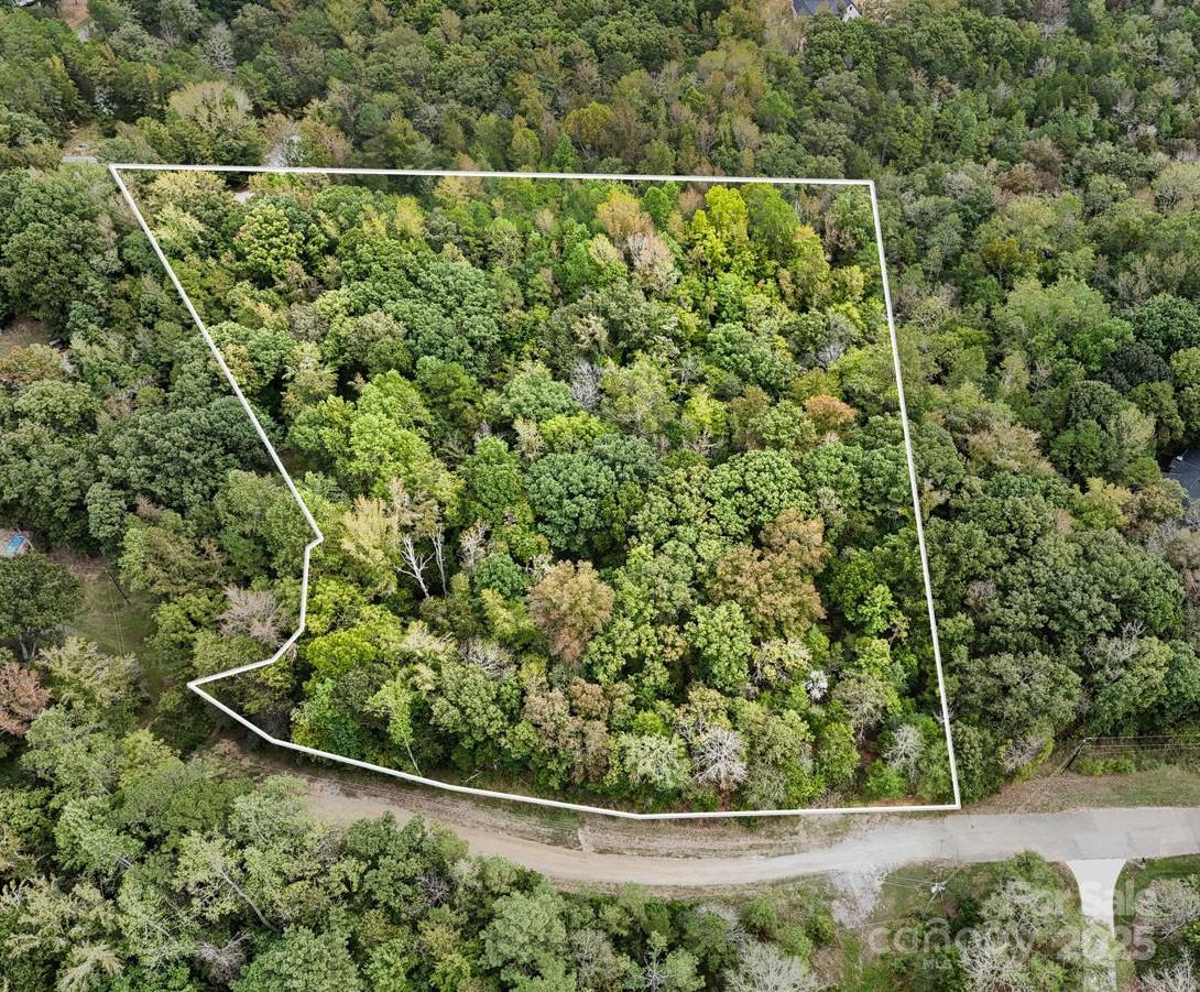 Welcome to your slice of country living in the heart of Waxhaw! Nestled at the end of a quiet, private cul-de-sac, this beautiful 3-acre wooded lot offers the perfect balance of privacy, flexibility, and convenience.

Zoned RA-40 with no HOA, this property opens the door to endless possibilities. Build your dream home with plenty of space for a barn, workshop, or detached garage. Create a mini-farm with horses, chickens, or goats, or design a peaceful retreat surrounded by nature. The land gently rolls to the rear, where you’ll find a tranquil stream that adds to the property’s charm and character.

Whether you envision fruit trees and gardens or a quiet outdoor living space, the terrain provides both beauty and function. Enjoy the freedom to bring your own builder or ask about trusted local options.

You’ll love the location—just minutes to downtown Waxhaw’s restaurants and shops, Lancaster, and Highway 200, making it easy to reach nearby conveniences while still enjoying the peaceful setting of Union County’s countryside.

If you’ve been searching for a property that offers space, privacy, and versatility—this is it. A rare opportunity to build exactly what you’ve imagined in one of the area’s most sought-after communities.

Subdivide potential with plenty of road frontage! Good news—this lot was recently soil tested and perced, making it ready for septic.