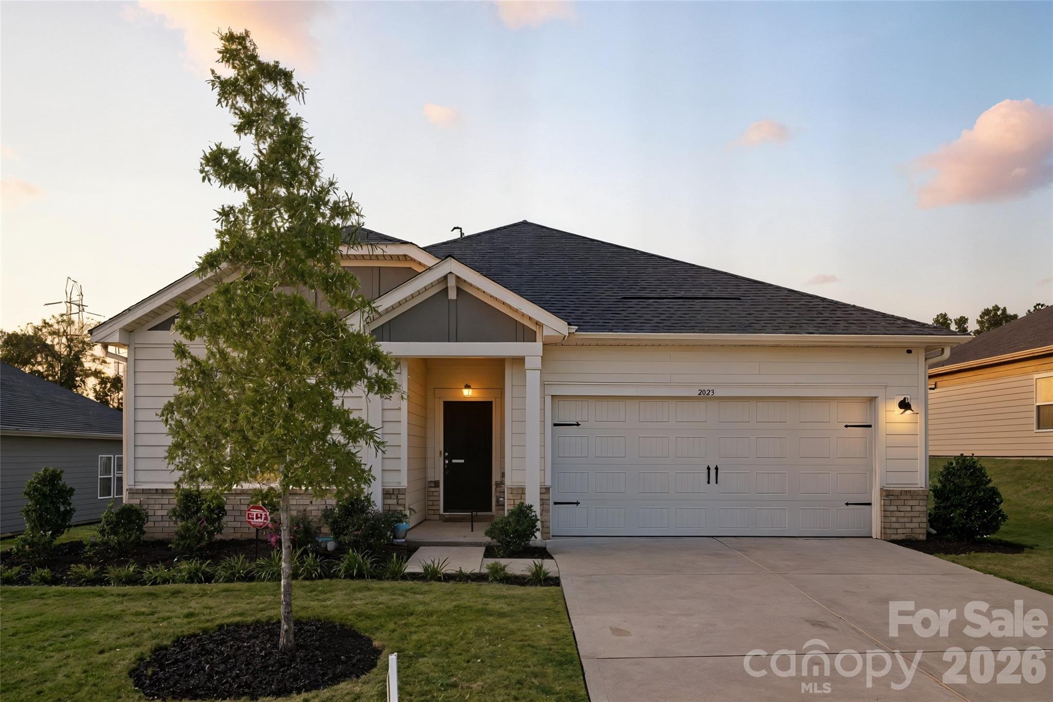 Motivated Seller...This nearly-new 2024 ranch delivers luxury, lifestyle, and value in one of Charlotte’s most desirable lakefront communities. Featuring 3 bedrooms, 2.5 baths, and a versatile flex room, this spacious layout is ideal for modern living.

The gourmet kitchen is a showstopper. Complete with double ovens, gas cooktop, upgraded cabinetry, and premium finishes throughout. An open-concept design flows effortlessly into the main living area, making entertaining or everyday relaxation easy.

Enjoy a fenced backyard, covered patio, and a quiet lot with no power lines or obstructions, (which is rare) features that enhance both privacy and outdoor living.

Additional highlights include: Oversized primary suite with spa-style bath...Resort-style amenities including pools, tennis courts, trails, and lake access...Scenic community with vibrant neighborhood energy…Backyard ready for you to add your landscaped design for additional privacy.

Move-in ready, with a flexible closing timeline available. Updated pricing reflects motivated sellers and a market-smart approach. Act now to secure this premium home before it's gone. It's waiting just for you. Schedule your showing today!