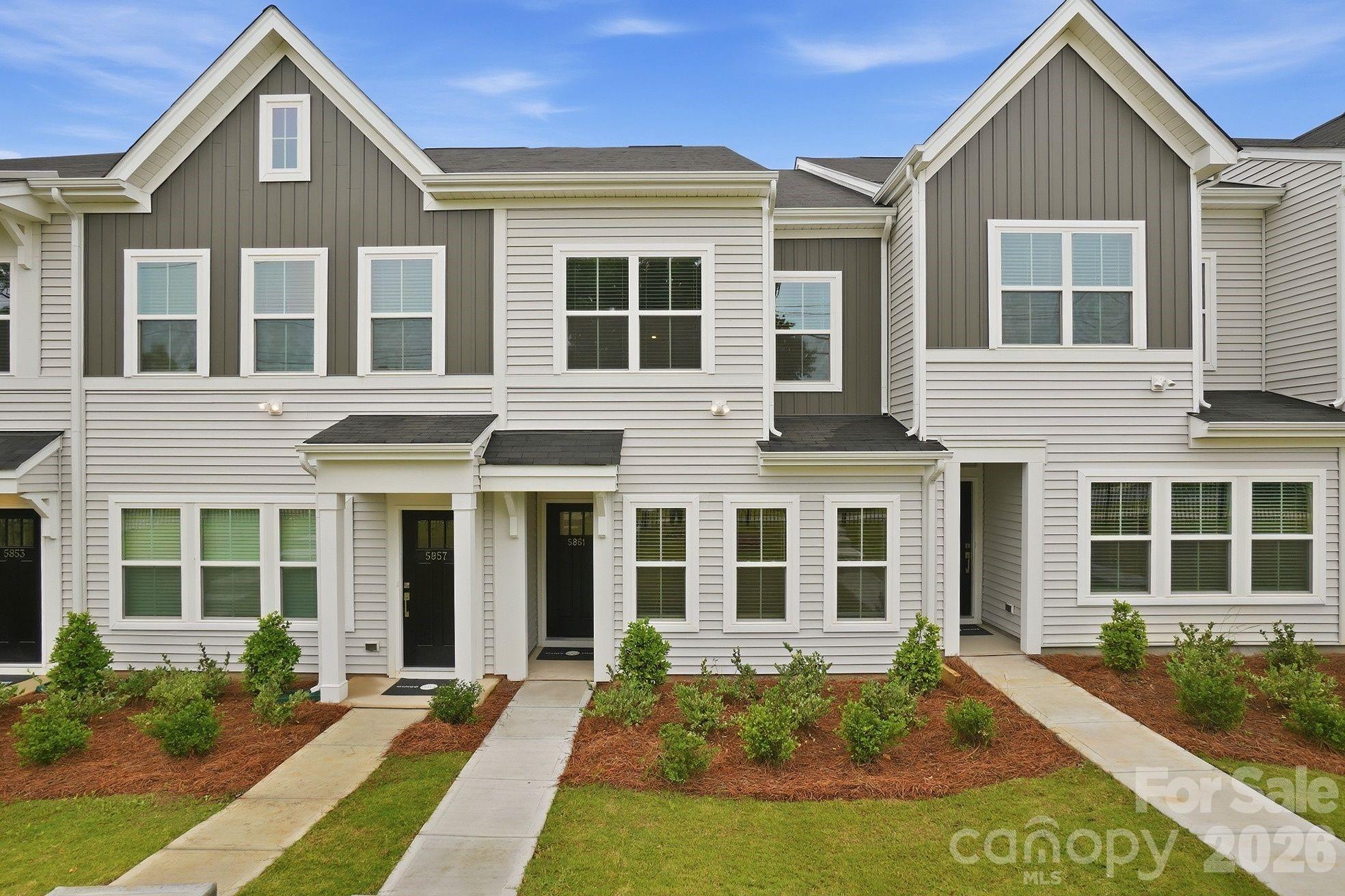 Built by Mungo Homes, this new construction townhome at Sloan Station offers 3 bedrooms, 2.5 bathrooms, an open-concept main level, and a spacious one-car garage. Designed for comfort and convenience, this home gives buyers the feel of single-family living with the ease of low-maintenance townhome ownership.

The main level features 9-foot ceilings, recessed lighting, luxury vinyl plank flooring, a pantry, mud room, and practical storage. The great room flows into the kitchen and eat-in dining area, creating an easy layout for daily living and entertaining. The kitchen includes a spacious island, quartz countertops, tile backsplash, pendant lighting, ample cabinet space, and luxury designer finishes. A powder room near the garage entry adds everyday convenience.

Upstairs, the primary suite features tray ceilings, a walk-in closet, double vanity sinks, quartz bathroom countertops, and a tiled shower. Two additional bedrooms, a full bathroom, and an upstairs laundry closet complete the second floor.

Sloan Station offers quick access to Uptown Charlotte, I-85, Charlotte Douglas International Airport, South End, Wesley Heights, FreeMoreWest, the West Morehead corridor, the U.S. National Whitewater Center, Charlotte Regional Farmers Market, dining, recreation, and major employment centers. Additional features include HOA-maintained exterior upkeep, a community dog park, a 2-10 structural warranty, and 30-day and 11-month builder checkups.