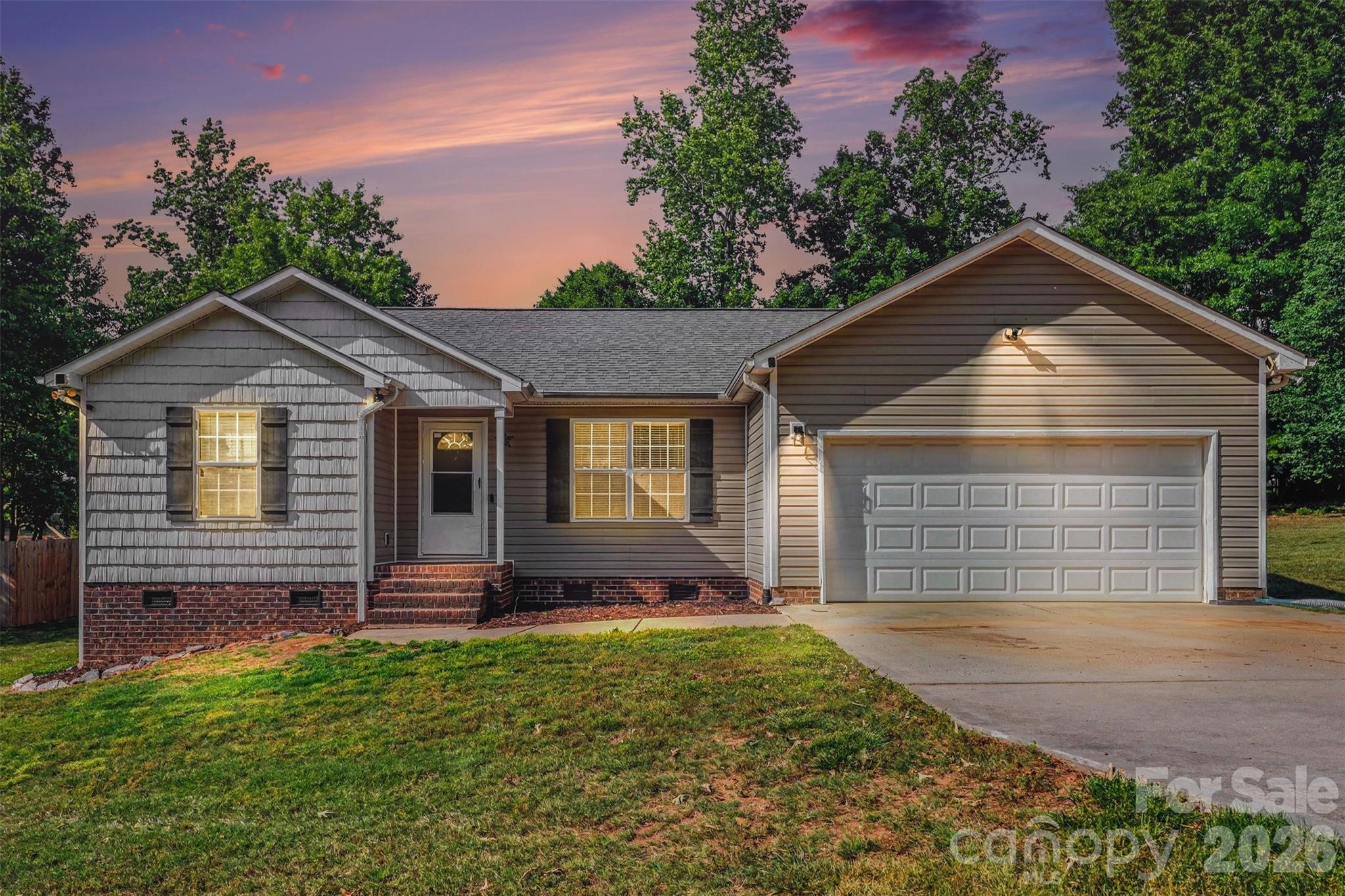 Beautifully maintained ranch home nestled in the peaceful Cool Springs area on over a half-acre lot with gorgeous country surroundings. This charming 3-bedroom, 2 bath home offers comfortable living in a quiet neighborhood setting. Major updates include HVAC replaced in 2023, new septic pump in 2022, refrigerator and stove replaced in 2025, and septic tank professionally pumped yearly for added peace of mind. Enjoy relaxing evenings on the newly redone back deck completed in late 2025. Garage has plenty of room and shelving that will stay. Conveniently located approximately 3 miles from the elementary and middle schools while still offering the serenity of country living. Quick approximate 10-minute drive to I-40 and I-77.