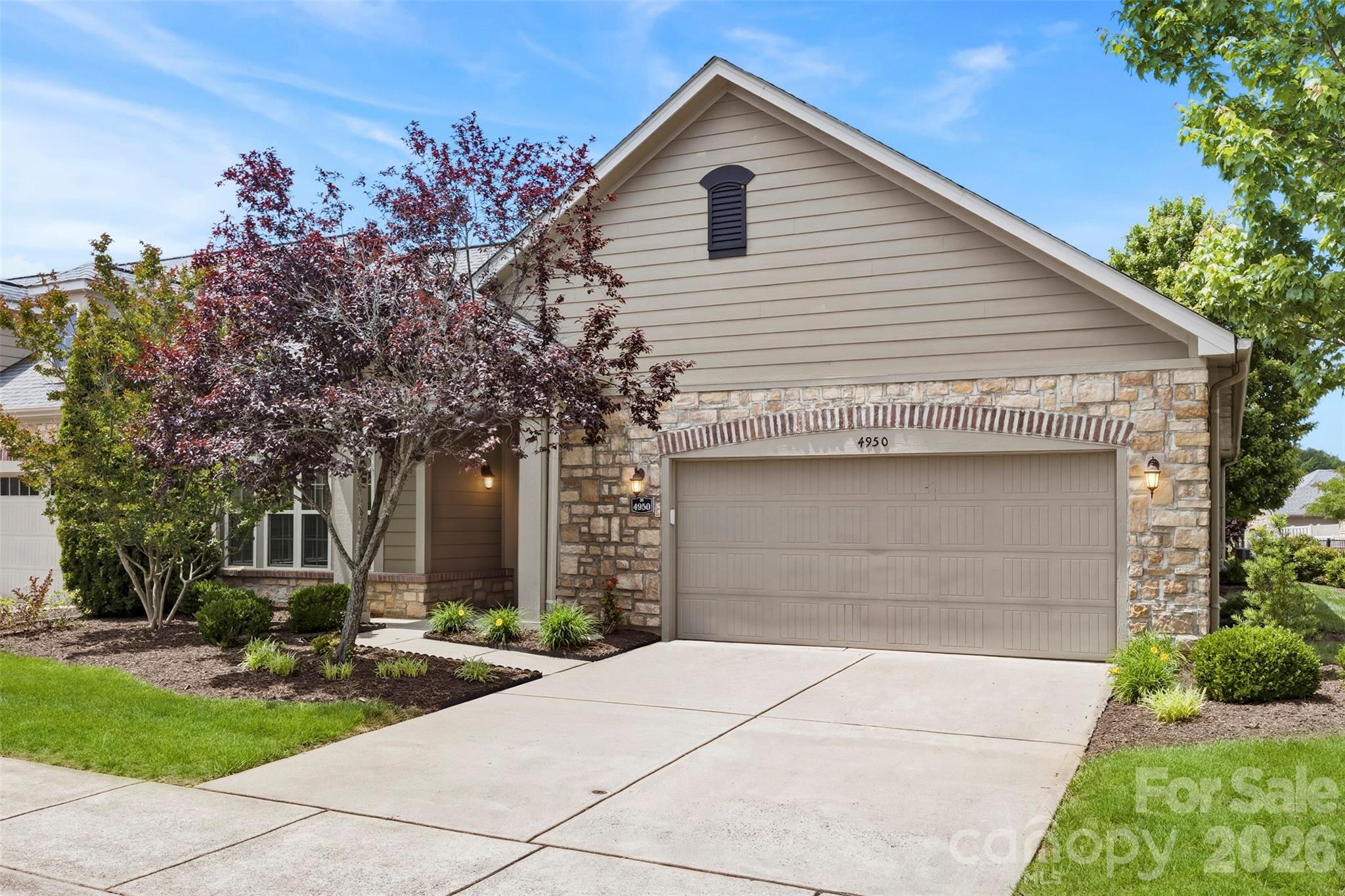 This remarkable home boasts quality and comfortable living. Relax in the sunroom and enjoy the day. The open living room with its beautiful fireplace and gas logs provides an additional area to enjoy, relax, and entertain. This floor plan offers ample space for entertaining yet is comfortable enough to simply relax. The dining area is large and bright with views of the inviting private patio. The kitchen offers granite countertops, a large island with a seating area, and so much more. There are 2 patio areas with this home, the privacy fenced courtyard area is big enough for entertaining plus grilling, and the 2nd patio is just right to sit and relax. The spacious master suite includes a large shower and a huge walk-in closet. This one-level home has an oversized garage plus a storage room off the private patio. Convenient to the clubhouse, pool, and activity areas. Close by shopping and restaurants make this a great place to call home.