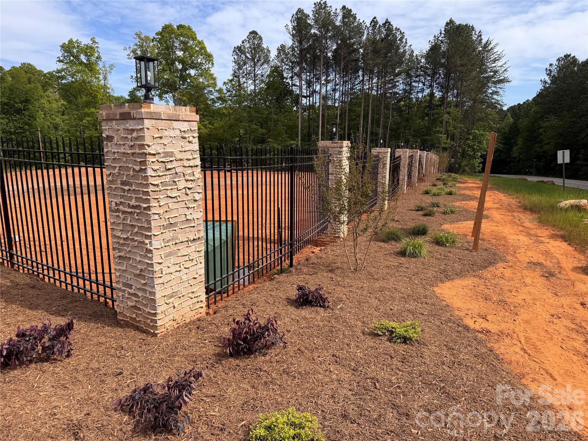 HOBBS CREEK RESERVE !!! This is a 36 lot Subdivision with minimum lot size of .60 acres. Some lots will be close to 1 +  acre. This will be a very exclusive Gated Community with no City Taxes and Mooresville School District as a bonus. The roads are already installed, and road base is being installed now. Lots are getting perc tested in the next 2 weeks and final surveying will be done also. We have additional 25 acres for phase 2 & 3 coming next. We are installing 21 brick columns with Black wrought iron fencing with two 14 ft drive through gates. We prefer to sell to one builder but will sell multiple lots or individual lots if needed. The community will be completed in the next few months max. This will be a HOA community with restrictions on house design and Sf Min. Soil reports show 17 four bedrooms and 17 three bedroom homes. Lot sizes vary