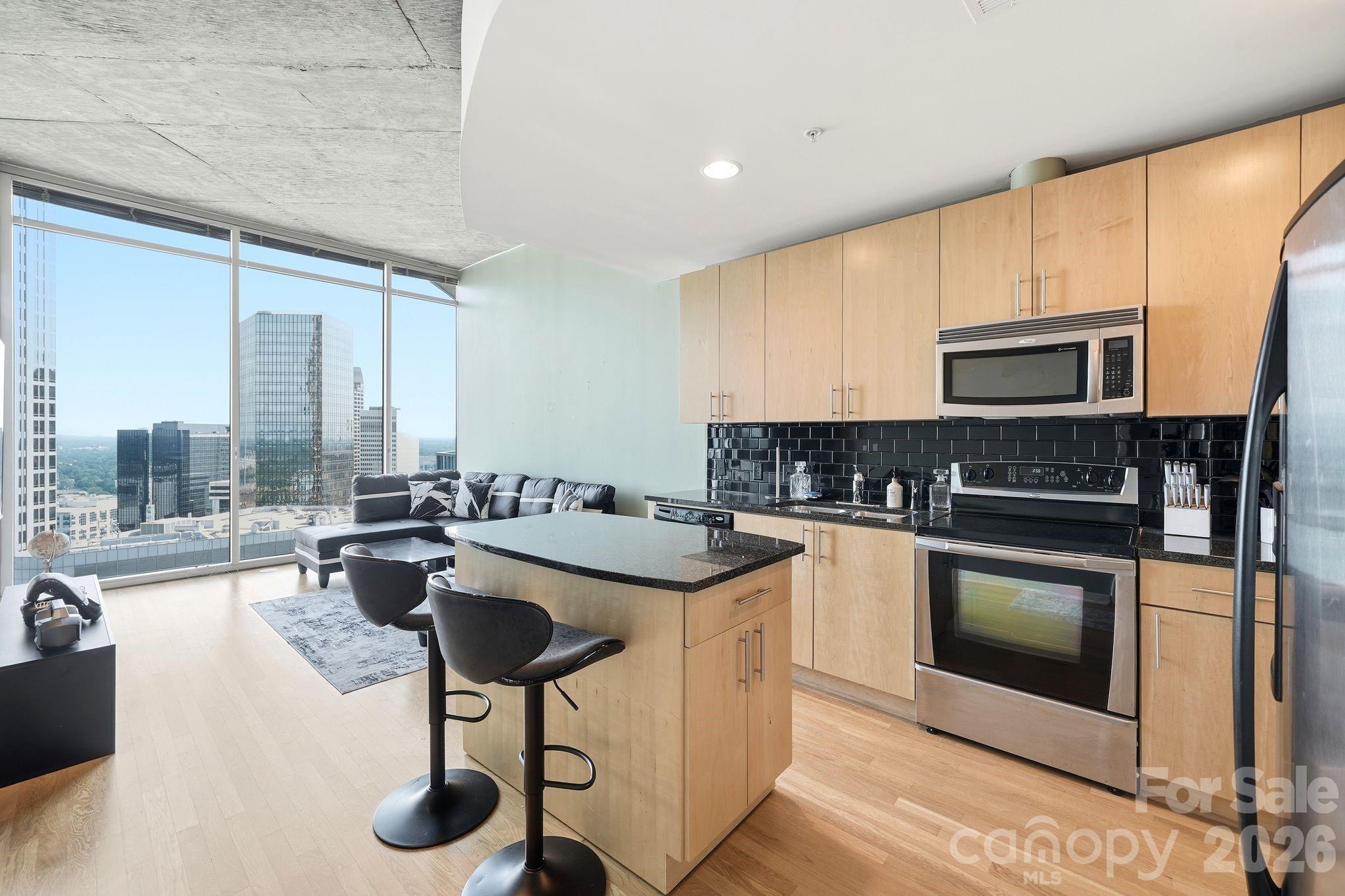 Floor 34 - 1-Bed Unit just below the Penthouse level.  Come see the breathtaking views of Uptown Charlotte - Facing the Inner City and Skyline. The Avenue Condominiums offer 24hour - 7 Day a week Concierge Service in the Lobby. The amenities on the 10th Floor include an Outdoor Pool, Terrace with Fireplace, 24-Hour Fitness Center, Game room and Space to host events with full kitchen. The Unit has 11-foot ceilings, an Island in the kitchen and granite counter tops and wood flooring throughout the unit.  A 1-Bed private Bathroom and Bedroom Suite. The living room comes with Floor ceiling Windows that provide stunning views of uptown and walkout to the balcony off the Primary Suite to take in the view over-looking Tryon St and 5th St with Bank of America Building in-front. 
Schedule your showings today.  Must Accompany an Agent to gain Access.