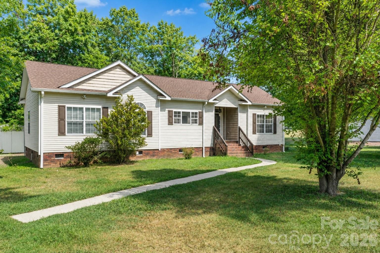 Back on the market no fault of seller. Under contract as contingent and the heartbroken buyers were unable to sell their home to purchase this one. This charming 3-bedroom, 2-bathroom home offers 1,640 square feet of thoughtfully designed living space, blending easy maintenance with a warm, inviting atmosphere. Tucked away on a quiet level lot just off Springs Road, you’ll enjoy a peaceful retreat that is perfectly positioned for a stress-free lifestyle. The location offers short drive times to the area's top destinations. You are just minutes from Downtown Conover and from the heart of Downtown Hickory, making it easy to enjoy local restaurants, shops, and seasonal events like the Hickory 5K Series. Major regional employers and essential services are also within reach, including Catawba Valley Medical Center and Frye Regional Medical Center. Inside, the heart of the home is a cozy living room with a fireplace. The kitchen features ample cabinet space and a central island that’s sure to be the hub for morning coffee preparing meals for family and friends. The primary bedroom suite features a walk-in closet and a primary bath with a double-sink vanity, a separate shower and a garden tub made for relaxing. With two additional bedrooms and a second full bath, there is plenty of room for everyone to feel right at home. Outside, the back deck provides a great place for summer BBQs and the spacious, level yard provides an ideal location any number of outdoor activities.