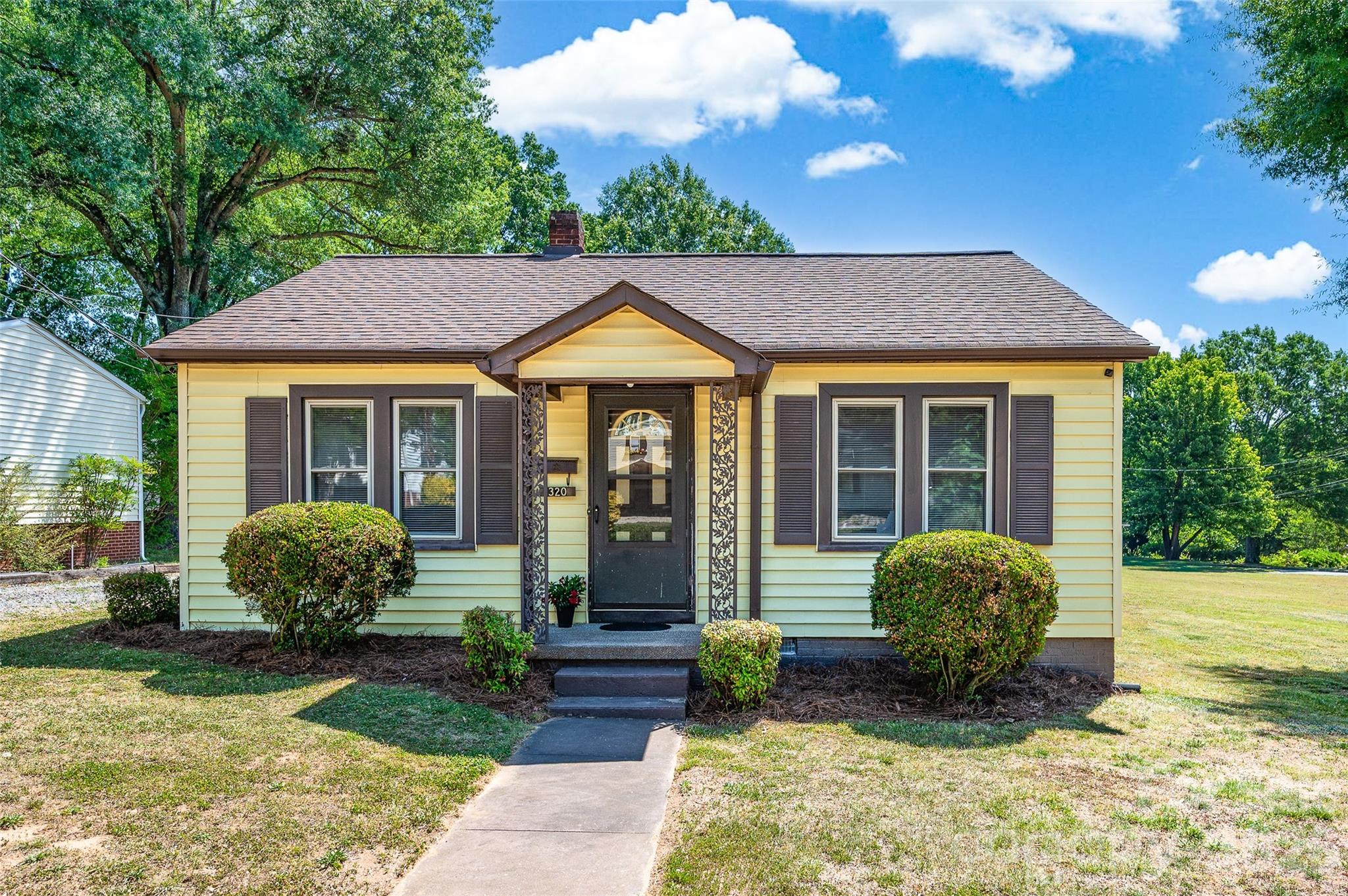 Adorable Bungalow that has not seen the market for 30 years!  Great bones to update and make it your own.  Tucked away on a quiet side street close to downtown Mooresville in the highly rated Mooresville Graded School District.   A detached one car block garage/shop with an oversized covered area off the back and a separate block storage building with two sides are also included. This home has been well cared for and just needs to be updated to 2026.  Has vinyl windows, HVAC (approx 8-9 years old), Roof (approx 10 years old). BONUS: An additional attached lot with .37 acres is also available for purchase with the home if desired.  Lot will not be sold until the home sells first. Buyer will have first option. The hard to find attached lot is a corner lot, cleared and flat.  Offers City water. No city sewer available at this time.  A portion of the two lots include a small section annexed into the city limits and will include a percentage of city tax.  House currently sits in the County.   House is on .301 acres and lot is .37 acres.  Lot is Parcel#4667623384  This is an estate and current seller has never lived in the home.  No septic permit on file with Iredell County.