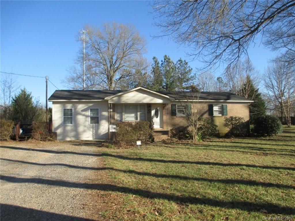 Great quiet setting with hardwood trees that offers 3 bedroom brick and vinyl siding home on 1 acre. Kitchen/dining has granite counter tops and ceramic flooring but hardwoods in living and bedrooms.