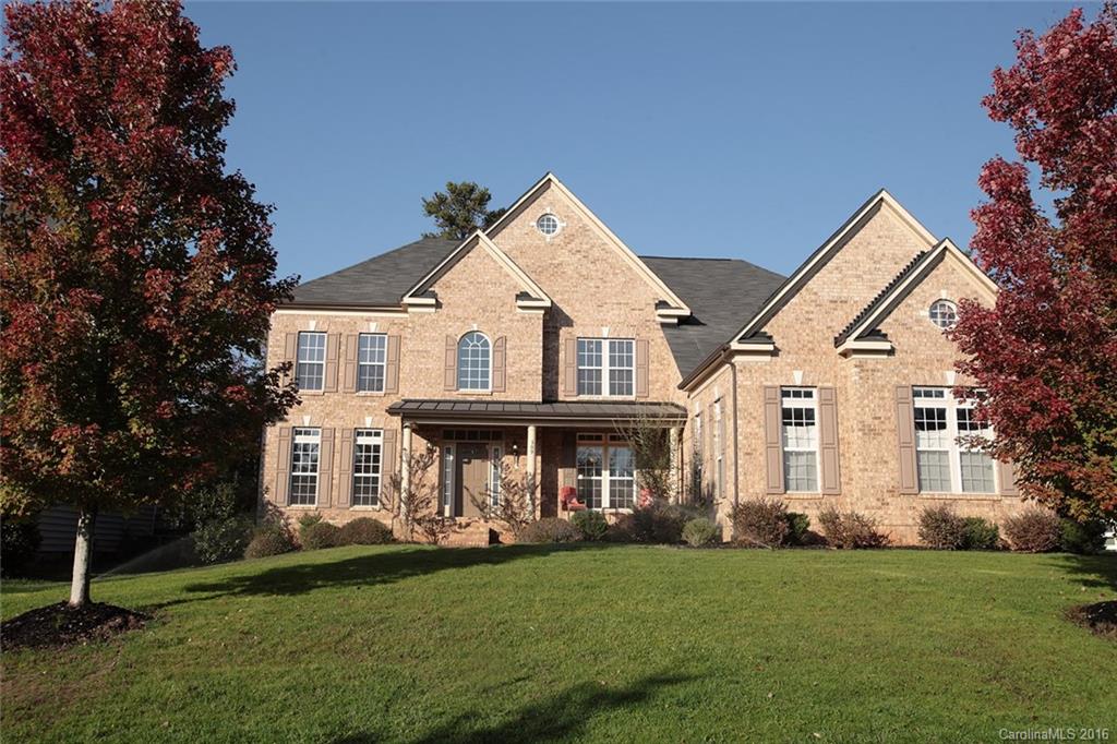 Estate living in the heart of Fort Mill! This lovely open-floor plan home is an entertaining dream. Epic foyer entrance, grand 2-story family room and main floor bedroom w/full bath attached. Chef's kitchen overlooks breakfast are and keeping room. Brick paver patio with built-in fire pit and an outdoor kitchen will leave your guests swooning. Luxurious finishings, home theater on 3rd floor and a jetted master spa that will take your breath away! Dual 50g water heaters. Surround sound wired.