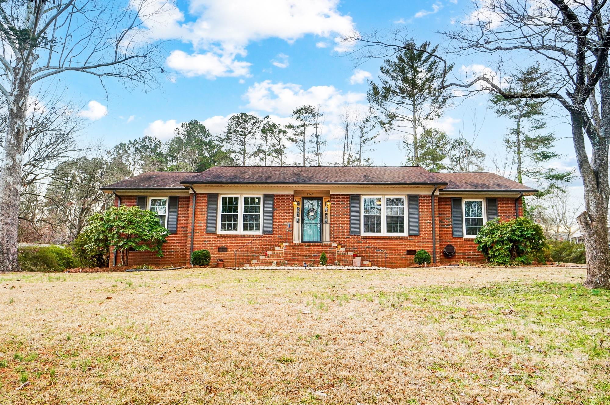Recently renovated full brick ranch in charming Winthrop area. This home has been updated with a new kitchen with huge island, quartz countertops, new cabinets, fixtures and appliances. Bathrooms also renovated with double rainfall shower and soaking tub in primary bath. New electrical service, new windows, whole house water filter, tankless water heater and more. You will love the outdoor areas perfect for gatherings with a large corner lot, storage shed, patio paver firepit area and a huge carport with barn doors which is currently used as a covered patio and entertainment area. Dont miss the storage closet in the carport! Walk to Cherry Park, Winthrop Lake, local coffee shop, and only minutes from downtown Rock Hill and I-77.