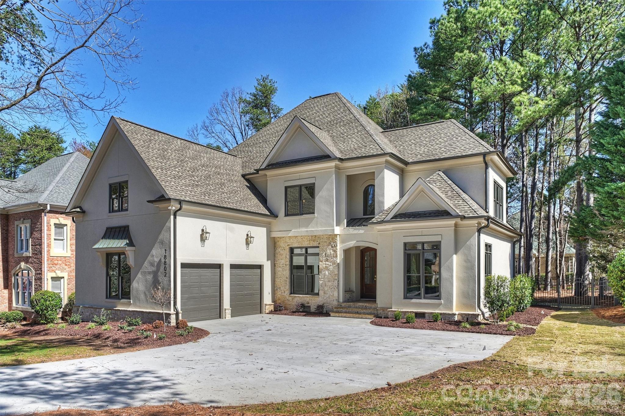 Welcome to your fully renovated dream home in The Peninsula — where timeless elegance meets modern luxury in one of the area’s most sought-after waterfront communities. 
This stunning 4-bedroom, 4 1/2-bath residence has been completely transformed with high-end finishes and thoughtful design throughout. From the moment you step inside, you’ll notice the rich warmth of brand-new hardwood floors spanning the entire main level, creating a seamless and sophisticated foundation for the home. All windows have been replaced, enhancing energy efficiency while allowing natural light to pour in and highlight the home’s clean lines and elevated craftsmanship.
The heart of the home is the beautifully redesigned kitchen. Featuring brand-new designer cabinetry, sleek quartz countertops, and premium finishes, this space is as functional as it is impressive. Whether you’re hosting a crowd or enjoying a quiet morning coffee, the open layout provides the perfect setting. Ample counter space, abundant storage, and a refined aesthetic make this kitchen truly show-stopping.
Just off the main kitchen, a newly added scullery elevates both form and function. This dedicated prep space offers additional cabinetry, quartz surfaces, and room for small appliances, making entertaining effortless while keeping the main kitchen pristine. Ideal for catering, a coffee station, or everyday organization, the scullery adds a layer of convenience and luxury rarely found in homes at this price point.
Upstairs, the spacious primary suite offers a private retreat designed for relaxation. The fully renovated primary bath feels like a spa, complete with an oversized walk-in shower, soaking tub, and all-new cabinetry topped with elegant quartz surfaces. Thoughtful details and modern finishes create a calm, luxurious atmosphere where you can unwind at the end of the day.
All secondary bathrooms have been completely redone with the same level of quality and attention to detail. Featuring new cabinetry, updated tile work, modern fixtures, and quartz countertops, each bath feels fresh, cohesive, and move-in ready. The secondary bedrooms are generously sized, providing comfort and privacy.
A large upstairs bonus room adds incredible flexibility to the floor plan. Perfect for a media room, playroom, home office, or gym, this expansive space allows you to tailor the home to your lifestyle while keeping the main living areas open and inviting.
With four full bathrooms and an additional half bath, convenience is built into every corner of the home.
Beyond the interior upgrades, the outdoor space is equally inviting. The fenced backyard provides privacy and flexibility — perfect for entertaining, pets, play, or simply enjoying a quiet evening outdoors.
Every inch of this home reflects quality renovation and true turnkey convenience. From the new hardwoods and replaced windows to the completely renovated kitchen, scullery, and bathrooms throughout, no detail has been overlooked. You’ll enjoy the peace of mind that comes with a home thoughtfully updated from top to bottom.
Located in The Peninsula, residents enjoy access to premier neighborhood amenities and a vibrant lifestyle near Lake Norman. This community offers a blend of recreation and refinement that is hard to match.
Turn-key, stylish, and thoughtfully upgraded — this exceptional property delivers luxury, practicality, and a premier address all in one. All that’s left to do is move in and start enjoying everything this beautifully renovated home has to offer.