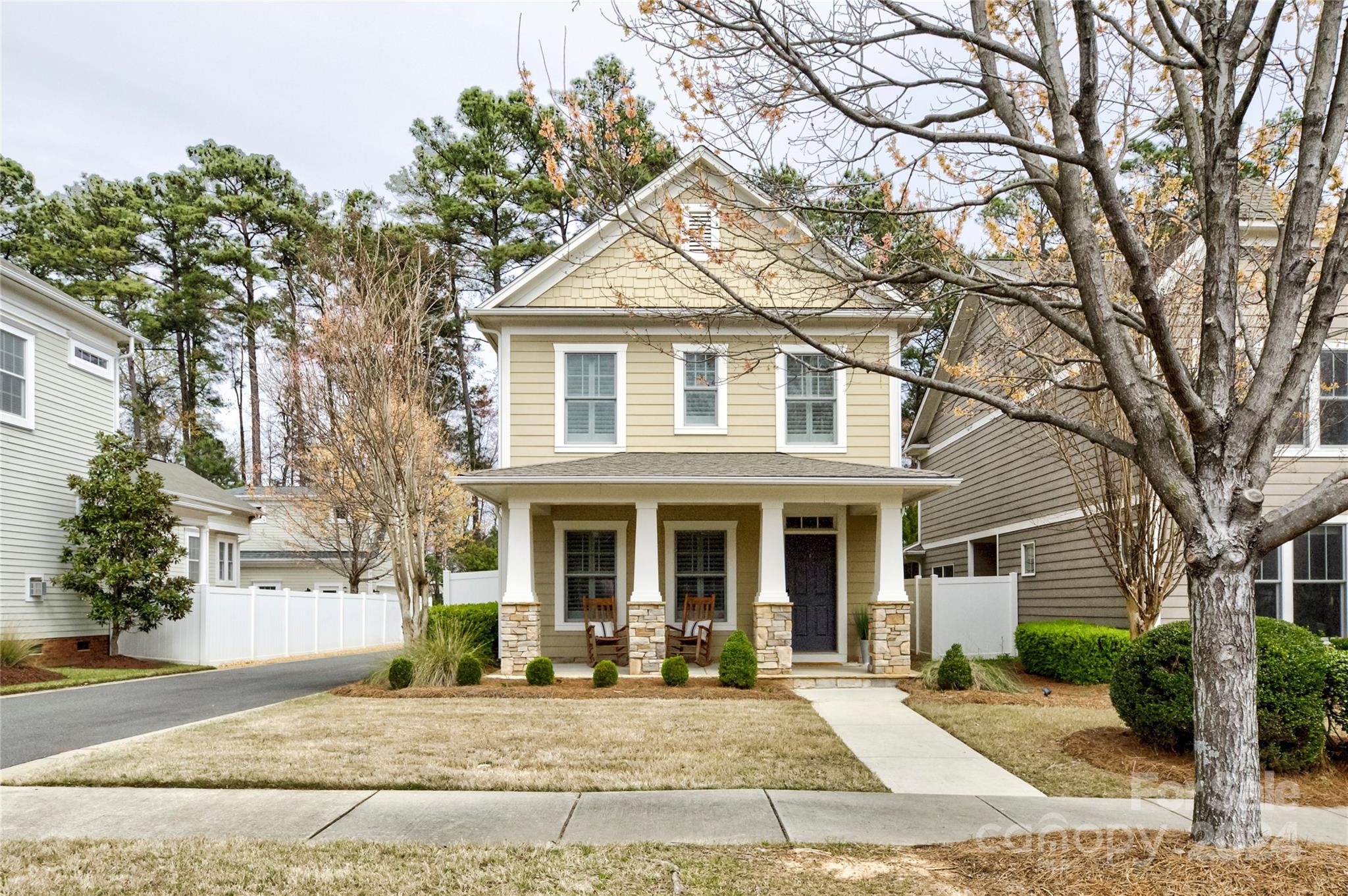 Nestled in the heart of Baxter Village this quaint yet modern cottage-style residence embodies the charm that is Fort Mill. Boasting 3 bedrooms and 2.5 bathrooms, the home flaunts an updated kitchen with sleek white quartz countertops and stainless steel appliances. The welcoming front porch beckons relaxation with its picturesque ambiance. Nearby, discover a family-friendly pool, playground, and vibrant community center. Enjoy the convenience of neighborhood amenities including restaurants, shops, a public library, and an elementary school—all within this sought-after community. Experience the essence of contemporary comfort in this idyllic Baxter Village abode.