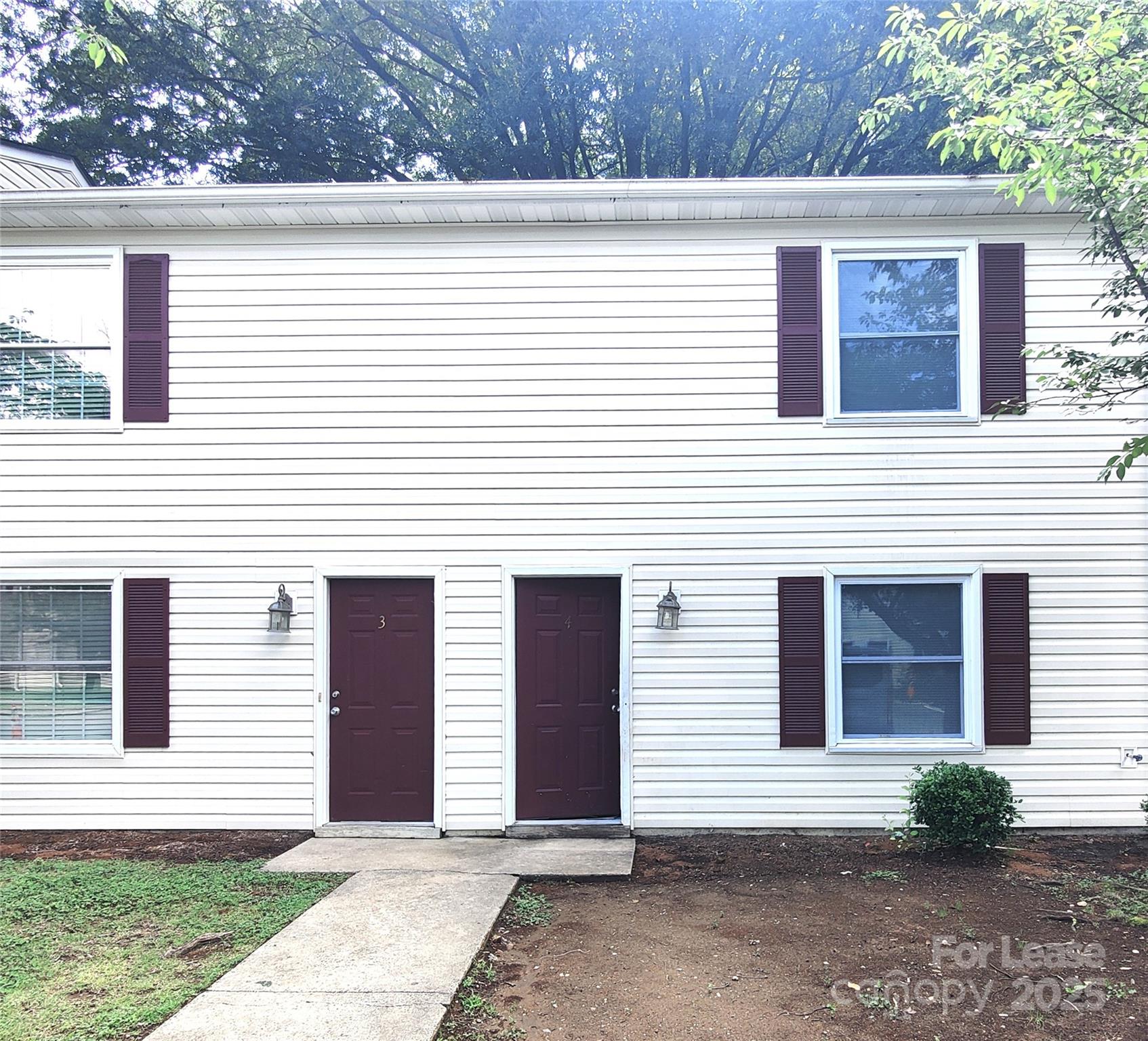 Adorable 2 bed, 1.5 bath condo, convenient to S Tryon St and I-485! Kitchen has granite counters, tile backsplash, and stainless steel appliances. Full bathroom on second floor has walk-in shower with gorgeous tile surround. LVP through most of the home.