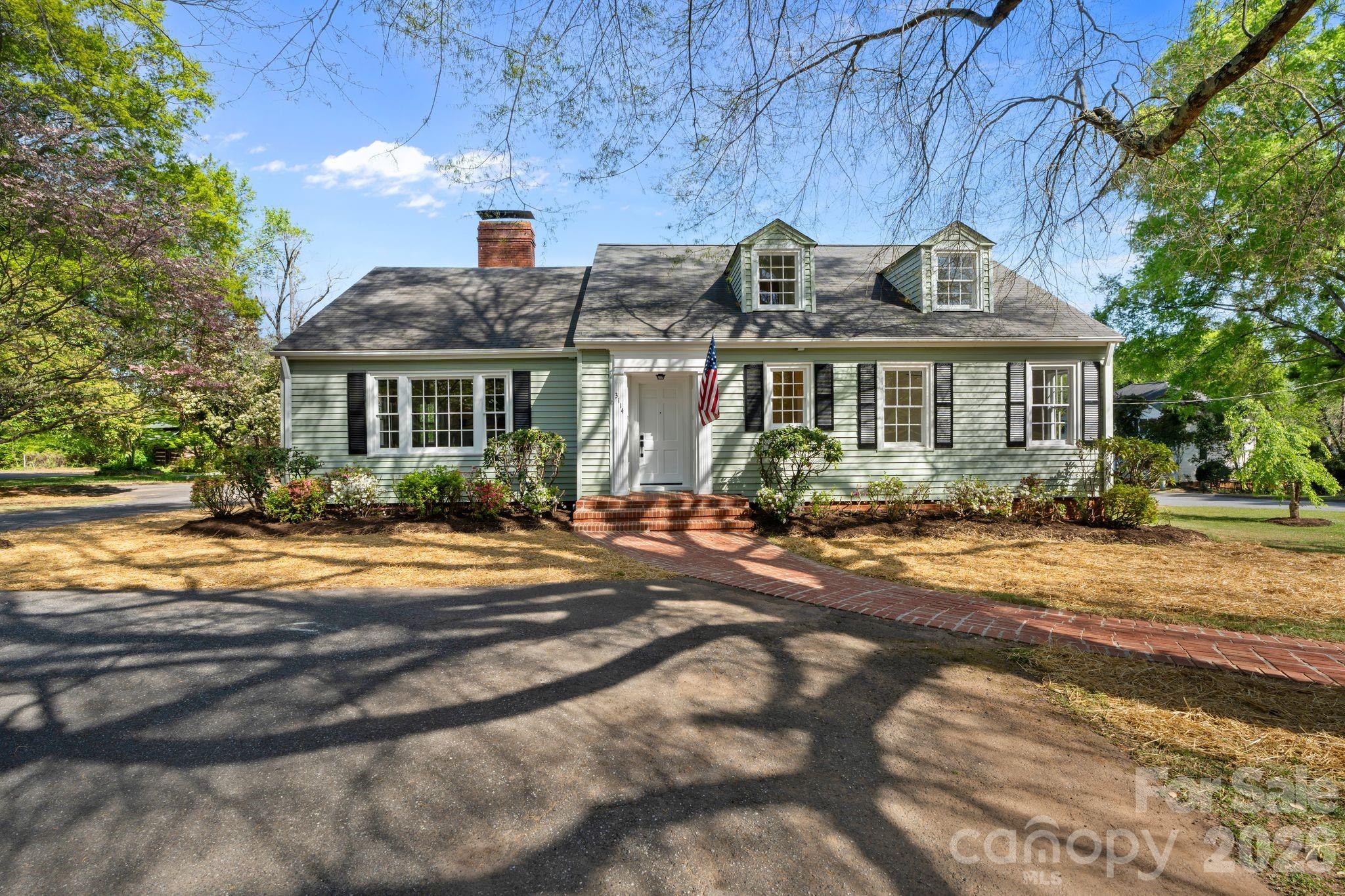 PRICED SIGNIFICANTLY LOWER THAN RECENT APPRAISAL!
Immaculate Cape Cod home fully renovated inside and out to its former glory - a true gem and elegant estate where original craftsmanship meets the modern updates buyers of today's market are looking for, without sacrificing a single ounce of soul! 
Offering high-end finishes throughout the home such as quartz counter tops and custom cabinetry in the kitchen with a colossal island, beautifully designed bathrooms, fully tiled showers with glass enclosures, brushed brass hardware and lighting, 2 masonry fireplaces, hardwood floors throughout the home, large sunroom, a huge 35' X 27' covered porch for entertaining, an over-sized 3 car garage and extra parking spaces. The lot is as gracious as the home itself, with mature and colorful landscapes and a circular driveway.  Large walk-in attic and basement for ample storage.  
All these without compromising location! North Center Street is widely regarded as one of Hickory's most desirable and recognizable addresses with a tree-lined corridor, that places you at the heart of everything that makes this city exceptional.  This home is a rare find offering both charm and elegance.
Seller to install choice of fencing or natural tree barrier along front roadway, or give a credit to the buyer.