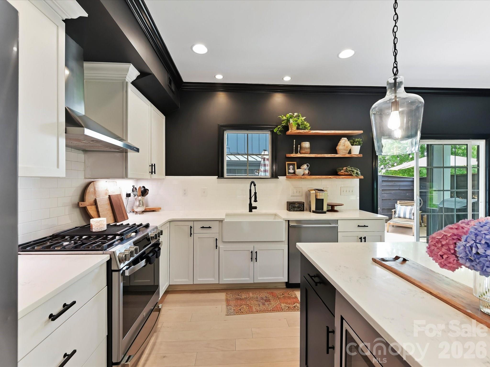Welcome to 1507 Landis Ave, ideally situated in the heart of Plaza Midwood—one of Charlotte’s most vibrant and walkable neighborhoods. This stunning and modern 4 bedrooms home features 3.5 baths, PLUS a two-car garage, all just moments from top-rated dining, breweries, shopping, and parks. Thoughtfully designed with both style and functionality in mind, the home boasts an inviting front porch, a welcoming entryway, and a bright open-concept layout—perfect for everyday living and effortless entertaining.The gourmet kitchen serves as the centerpiece, showcasing quartz countertops, premium stainless steel appliances, and elevated finishes, all flowing seamlessly into a sun-filled living and dining area. Step outside to your own private backyard oasis, complete with patio, fire pit, and privacy fencing. Upstairs, the spacious primary suite offers a serene retreat with a spa-inspired bath and a generous walk-in closet.Two additional bedrooms and bath complete the upstairs. The third-floor guest suite and bonus room provides exceptional flexibility—ideal for visitors, a home office, or a private getaway. An attached two-car garage adds convenience, along with ample street parking, while the unbeatable location delivers the perfect blend of urban living and neighborhood charm.
