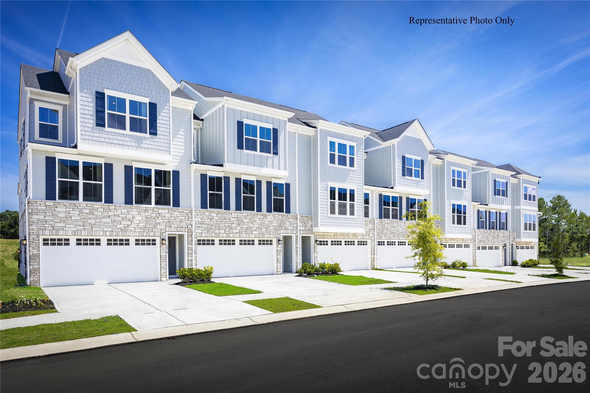 Welcome to Creek Water! New Construction, Premium End Unit with private wooded view! Indian Land's newest luxury town home community nestled in a quiet wooded area away from the hustle & bustle, but minutes from every day conveniences. Just south of Ballantyne, Hwy 485, Novant Medical Center, Publix, Harris Teeter, Walmart, Lowes, Costco & Target! This Serenade plan sits on a premium homesite backing to woods with nature views and showcases unique design elements typically found in single family homes. This charming townhome offers comfortable living in a thoughtfully designed setting, highlighted by its prime location beside a generously sized common area—perfect for enjoying open space, outdoor relaxation, and a sense of community right outside your door. An open, light filled main living area with a spacious kitchen including quartz counters, upgraded cabinets & a 10' island. Two highlights of this home are the covered outdoor living area off the main floor & the bed/bath option on the 1st floor. Enjoy rural tranquility near all your everyday conveniences in a master planned community w/ a beautiful future amenity with a pool & cabana, as well as the adjacent Deputy Roy Harden Park with playground, trails and picnic pavilions. Plus, receive up to $21,249 in closing cost credits with the use of the builder's preferred lender. You will not want to miss out on owning one of these exclusive luxury town homes!