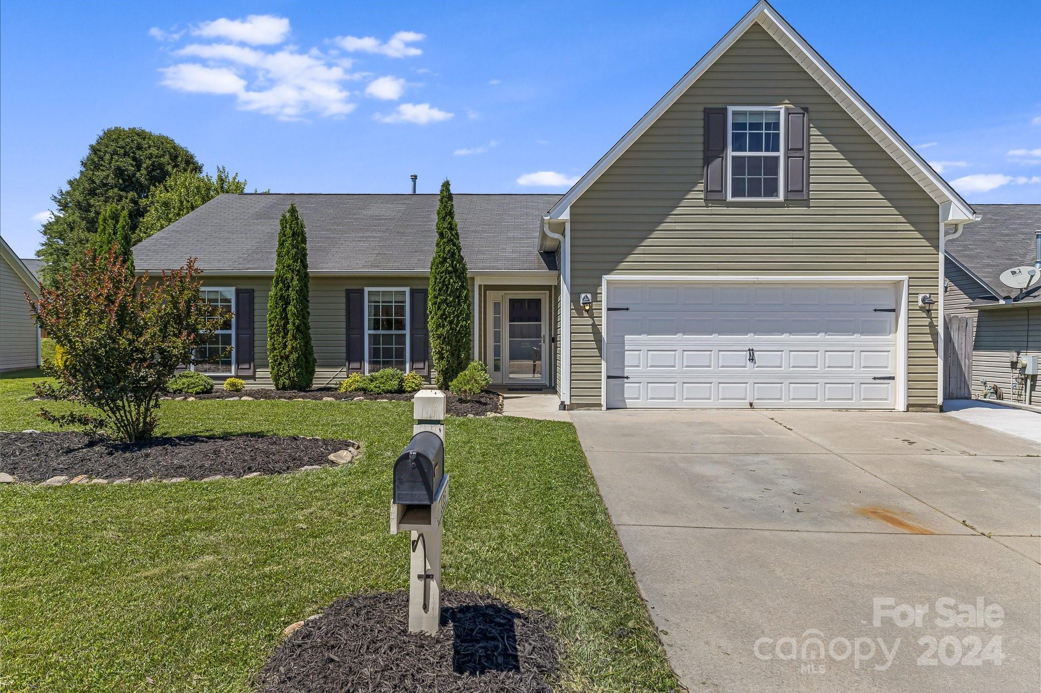 Welcome to this beautifully updated, open-concept home featuring a meticulously maintained interior and exterior. Step into a spacious living area with a tiled fireplace and open concept. The modern kitchen boasts updated cabinets, a new sink, stunning granite countertops, a stylish backsplash, and a large island complemented by newer appliances and luxury vinyl plank floors. Each bedroom is equipped with ceiling fans for added comfort. The smaller bathroom features a new vanity, while the garage includes a 220v circuit, perfect for an electric vehicle. Outside, enjoy a fenced backyard with a large stamped patio, ideal for entertaining and wired for indoor/outdoor speakers. The home also offers an extended parking area and is within walking distance to the neighborhood pool, playground, and picnic area, with the added charm of weekly food trucks. This home is a perfect blend of style, convenience, and community.  Check out the 3D Matterport Tour: https://bit.ly/335WSwift3D