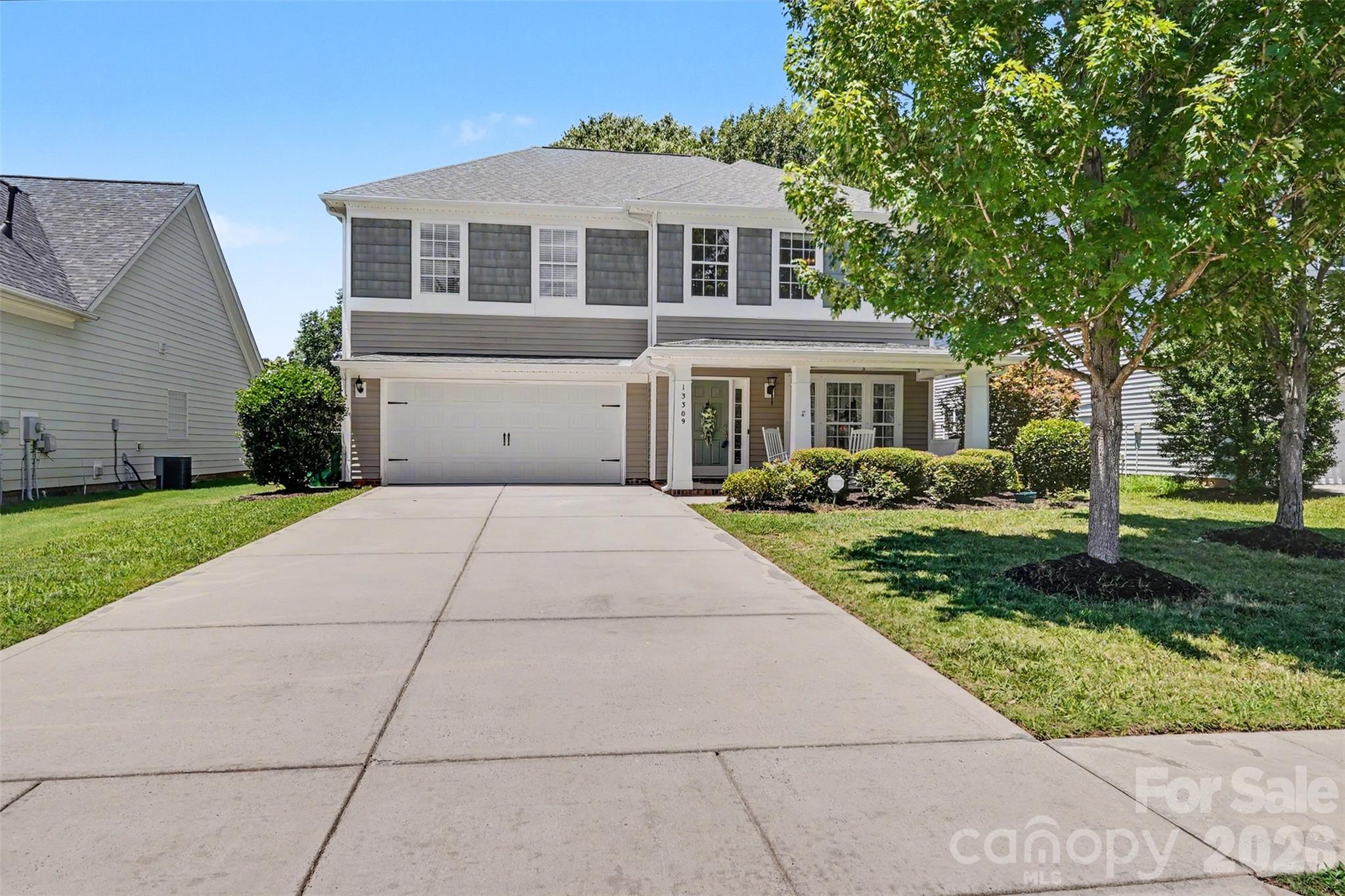 Welcome to Arbor Creek, where comfort, convenience, and modern living come together in this beautifully maintained 4-bedroom, 2.5-bath home with a versatile loft and abundant storage throughout.

Step inside and you'll immediately appreciate the bright, open floor plan designed for both everyday living and effortless entertaining. The spacious living and dining areas are enhanced by beautiful bay windows that fill the home with natural light and create a warm, inviting atmosphere.

The gourmet kitchen is sure to become the heart of the home. You'll enjoy preparing your favorite meals with granite countertops, stainless steel appliances, a stylish tile backsplash, 42-inch cabinetry, abundant counter space, and a large center island perfect for gathering with family and friends. Whether you're hosting holiday dinners or enjoying a quiet morning coffee, this space was designed to bring people together. Just beyond the kitchen, the cozy family room with a fireplace offers the perfect place to relax and unwind at the end of the day.

Upstairs, the spacious loft provides endless possibilities as a home office, media room, playroom, fitness area, or second living space. The primary suite serves as a private retreat featuring dual closets and an ensuite bath with dual vanities. Three additional bedrooms, a full bath, and a conveniently located laundry room complete the upper level.

Step outside to the newly fenced backyard where you'll have plenty of room for pets, play, gardening, or weekend cookouts with family and friends. The attached two-car garage provides additional storage and everyday convenience.

One of the home's most desirable features is its exceptional location. Enjoy the convenience of shopping, restaurants, everyday services, and neighborhood amenities just a short walk away. With easy access to Uptown Charlotte, University Research Park, major employers, and Lake Norman, you'll love having everything you need close to home.

This move-in-ready home offers the perfect combination of space, comfort, and convenience. Come see why Arbor Creek is such a wonderful place to call home.