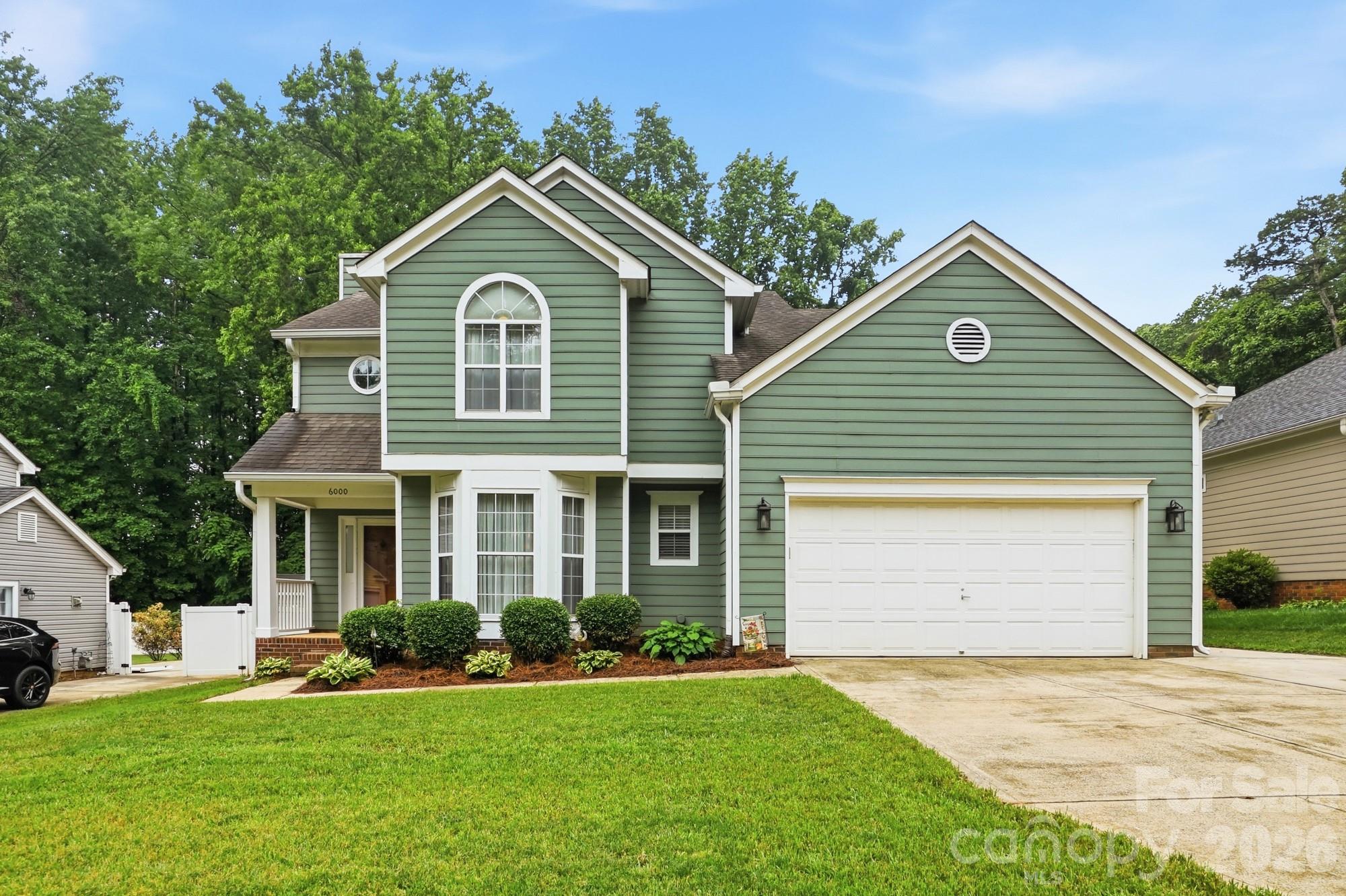 Welcome home to this beautiful, well cared for & one owner home!  Located in a quiet neighborhood but conveniently located to shopping, restaurants, airport & hospitals.  This home features an open floorplan with large living room & wood burning fireplace, dining area for family gatherings with bayed in window, laundry area & washer/dryer will remain, kitchen with plenty of cabinets & light colored Corian countertops, refrigerator will remain, sunroom/office or playroom added 2005 & 1/2 half located downstairs.  Upstairs features Primary bedroom with ensuite bath including garden tub & separate shower, 2 more spacious bedrooms + bonus room or 4th bedroom with plenty of storage.  Enjoy the deck & beautiful backyard with storage building for your lawn equipment & has 2 car garage.