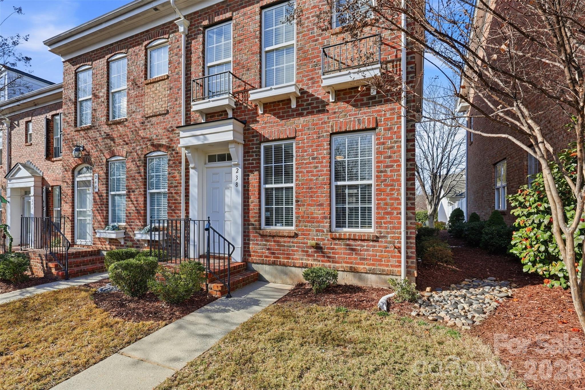 Welcome home to 238 Welton Way! A wonderful end unit townhome located in desirable Morrison Plantation with the convenience of in neighborhood shopping, dining, and just minutes from I-77. You will love the open floor plan, fresh paint, beautiful hardwood floors, breakfast bar, stainless steel appliances, as well as the architectural details. The main floor features a fireplace and half bath and the upper floor has two bedrooms both with en-suite bathrooms. Relax in your private, fenced backyard attached to an oversized 1 car garage large enough for your car and storage. Low maintenance living at its best in this beautiful community.